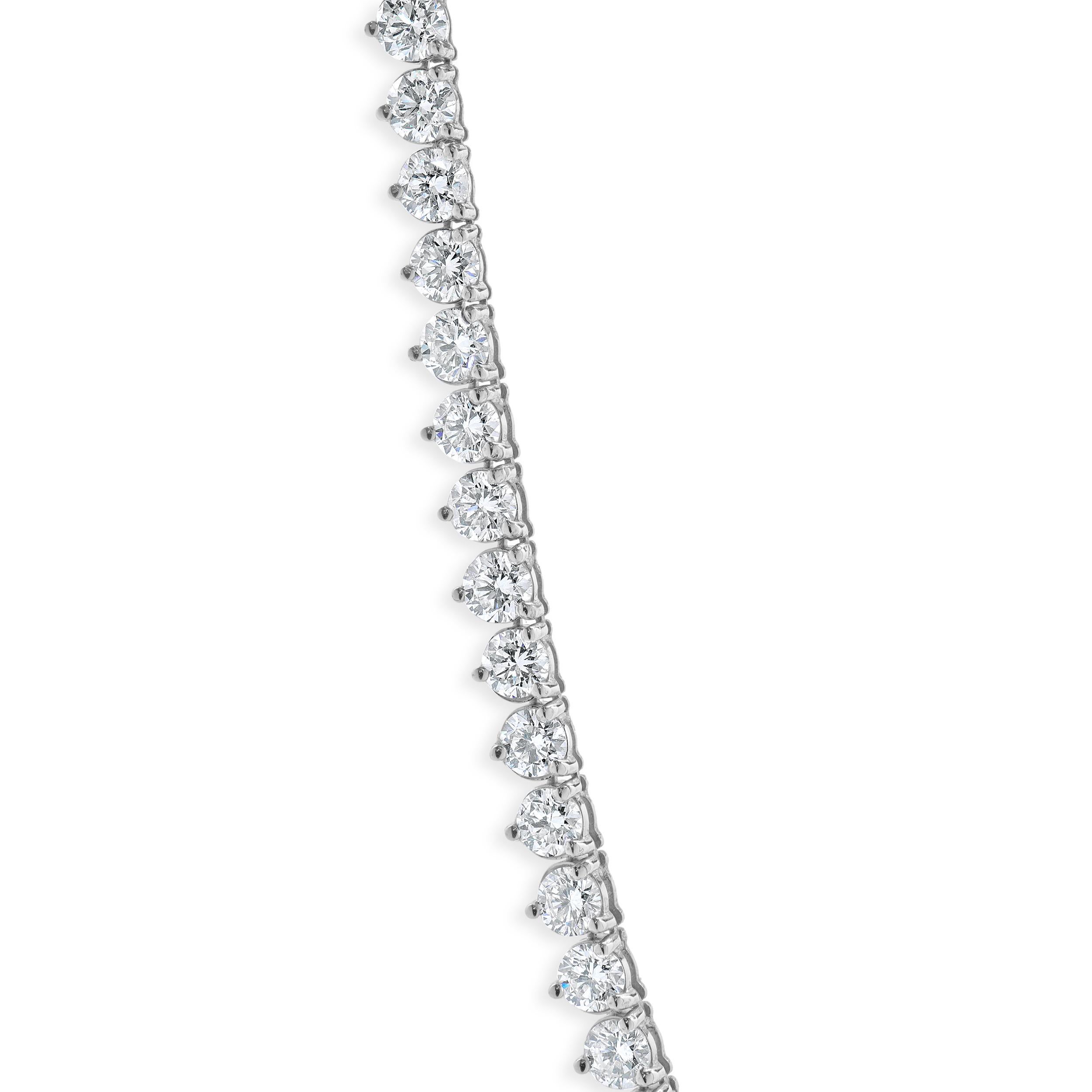 Designer: custom
Material: 14K white gold
Diamonds: 71 round brilliant cut = 10.65cttw
Color: H
Clarity: SI1-2
Dimensions: necklace measures 14-inches in length
Weight: 13.45 grams
