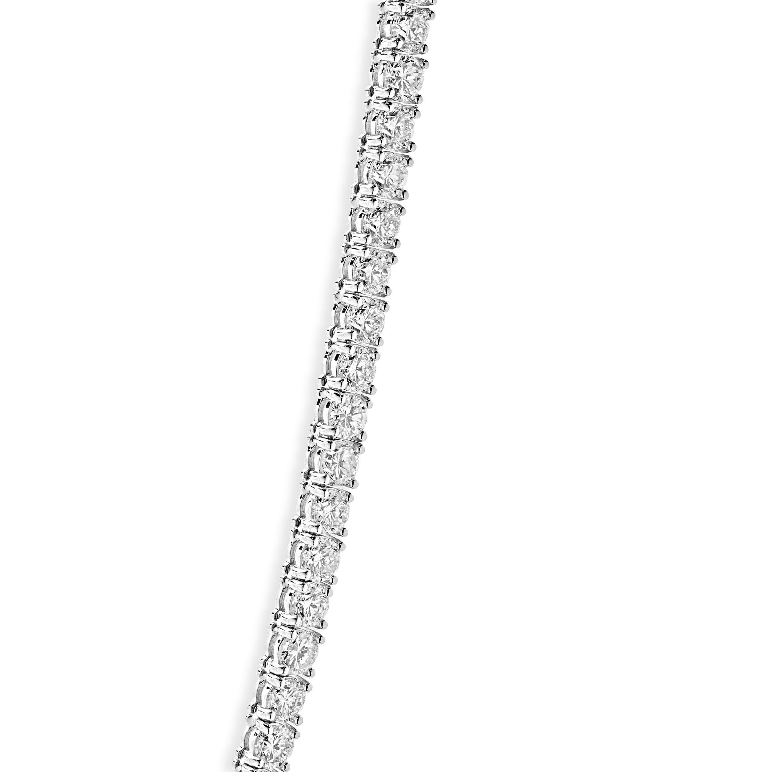 Designer: custom design
Material: 14K white gold
Diamond: 123 round brilliant cut = 29.25cttw
Color: G/H
Clarity: VS-SI1
Dimensions: necklace measures 20-inches in length
Weight: 35.01 grams
