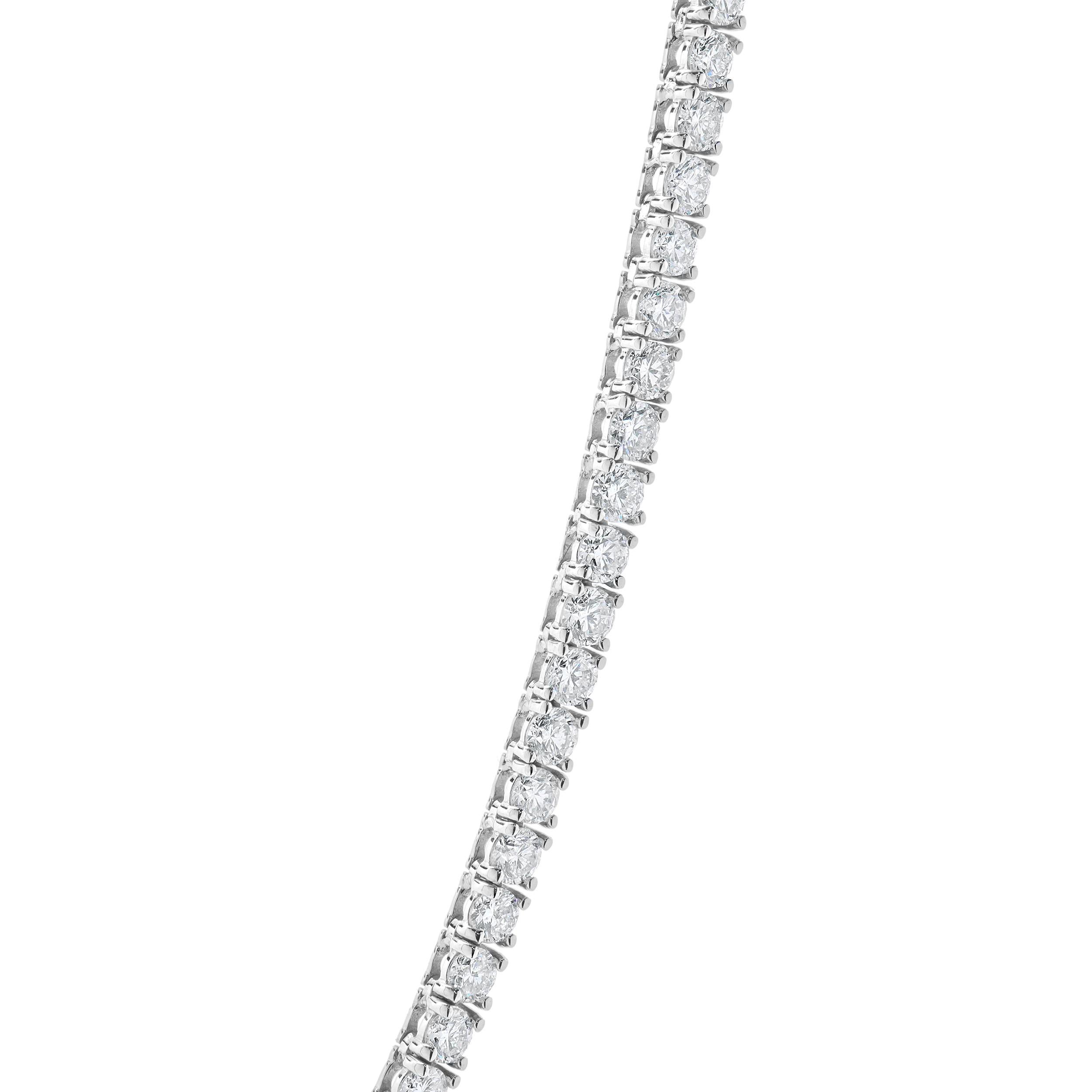 Designer : design personnalisé
Matériau : Or blanc 14k
Diamant : 151 diamants ronds de taille brillant = 9,51cttw
Couleur : H
Clarté : SI2
Dimensions : le collier mesure 16.5 pouces de long.
Poids : 17,10 grammes