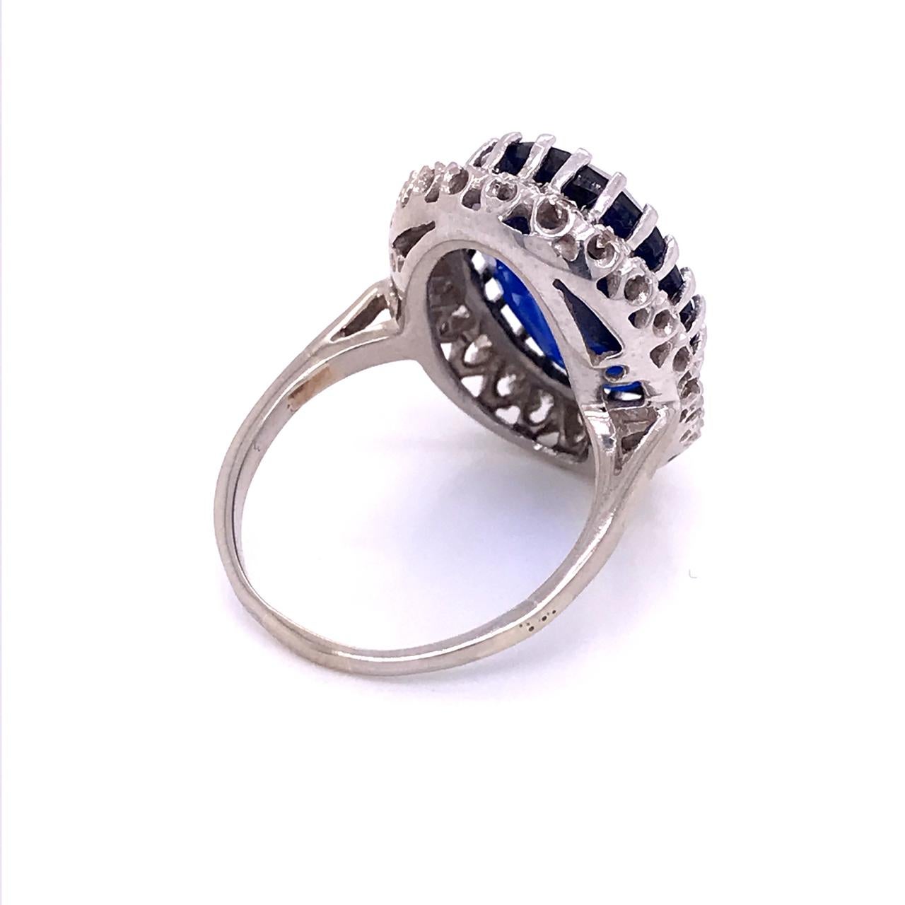14 Karat White Gold, Diamond, and Large Blue Topaz Cocktail Ring For Sale 3