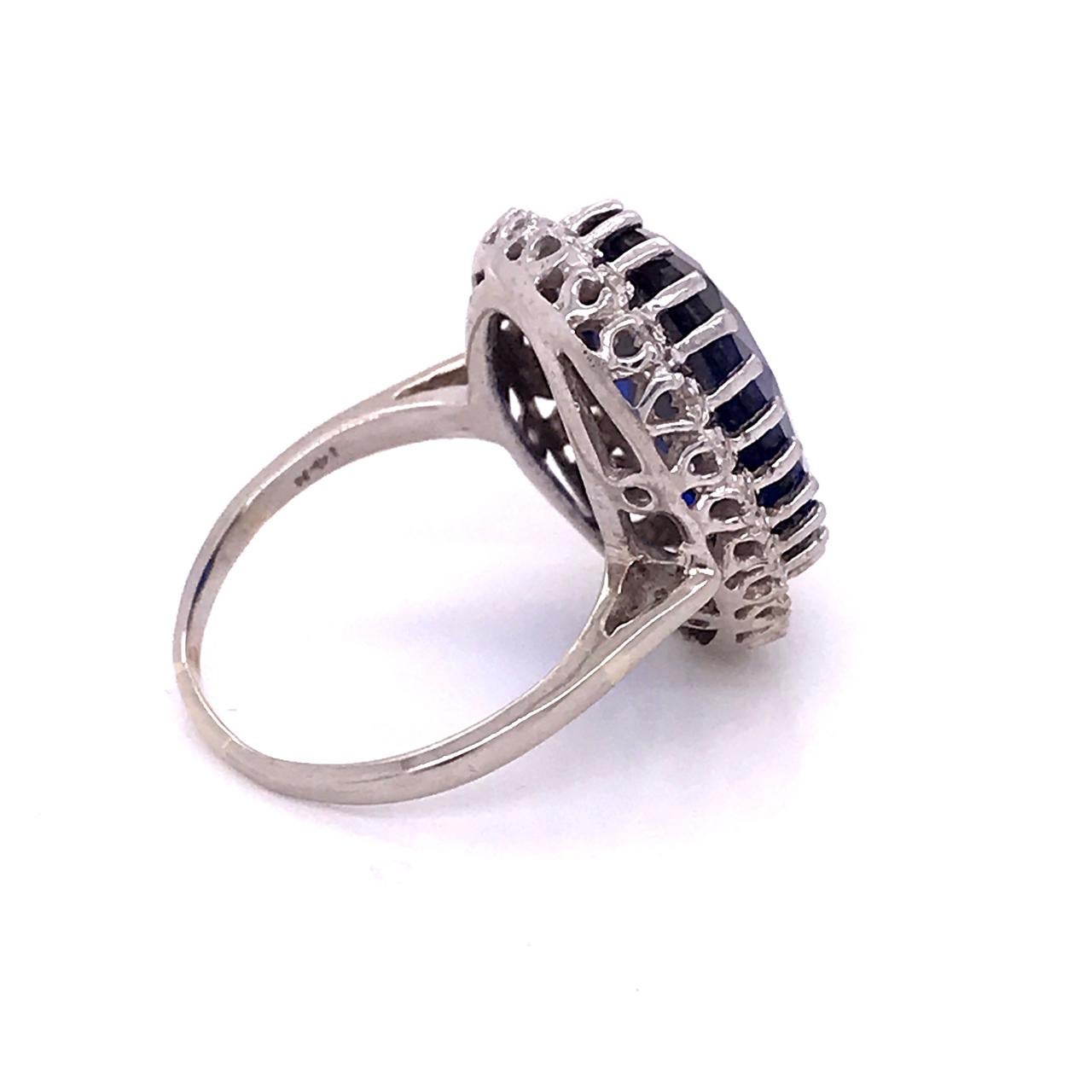 14 Karat White Gold, Diamond, and Large Blue Topaz Cocktail Ring In Good Condition For Sale In Philadelphia, PA