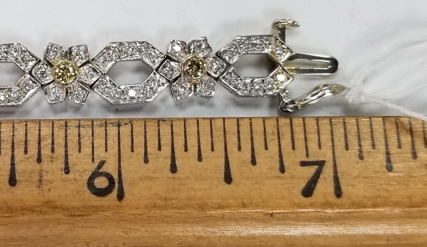 Women's or Men's 14 Karat White Gold Diamond Link Bracelet with Natural Yellow Diamonds For Sale