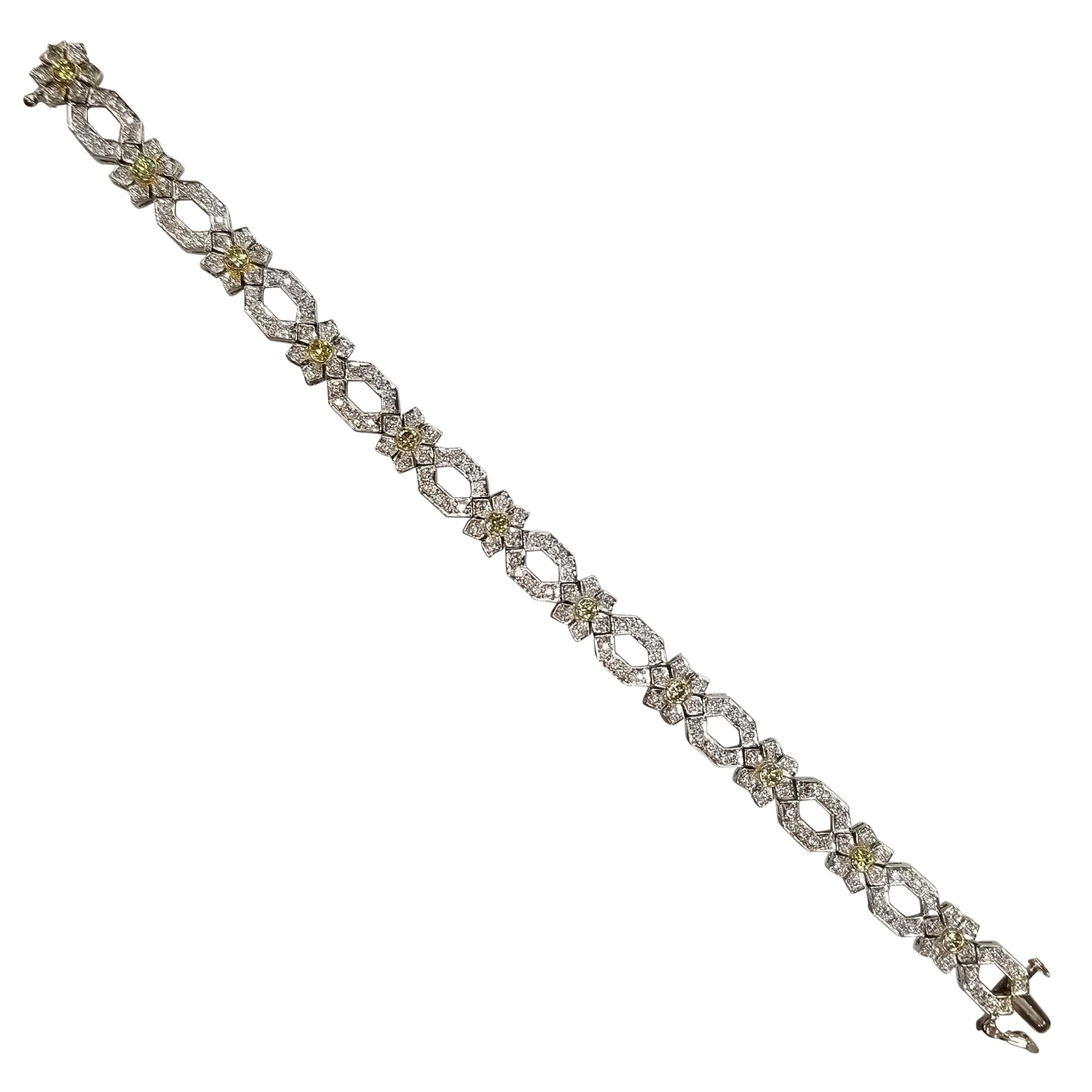 14 Karat White Gold Diamond Link Bracelet with Natural Yellow Diamonds