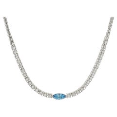 14 Karat White Gold Diamond Necklace with Blue Marquise Cut Diamond Centerpiece
