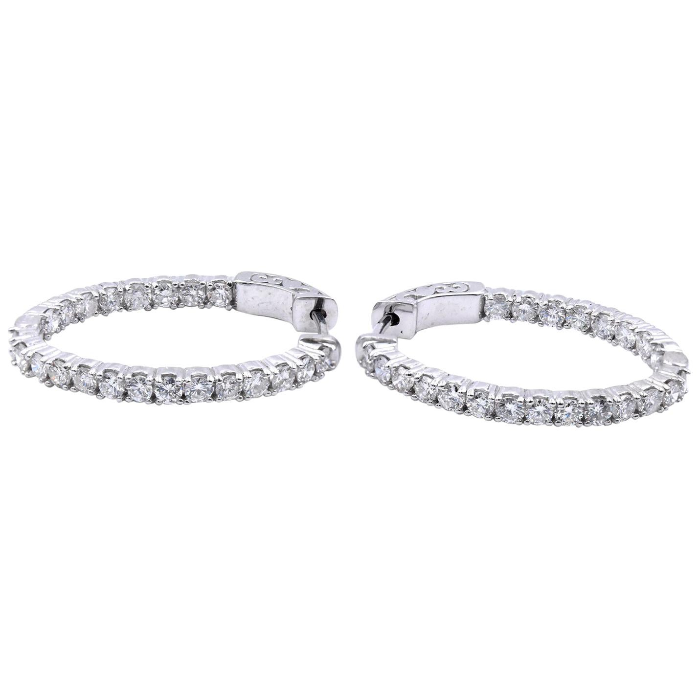 14 Karat White Gold Diamond Oval Hoop Earrings