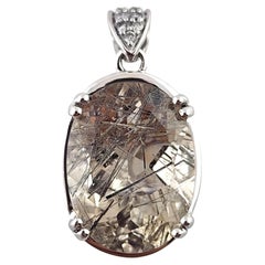 14 Karat White Gold Diamond Oval Rutilated Quartz Pendant #19039
