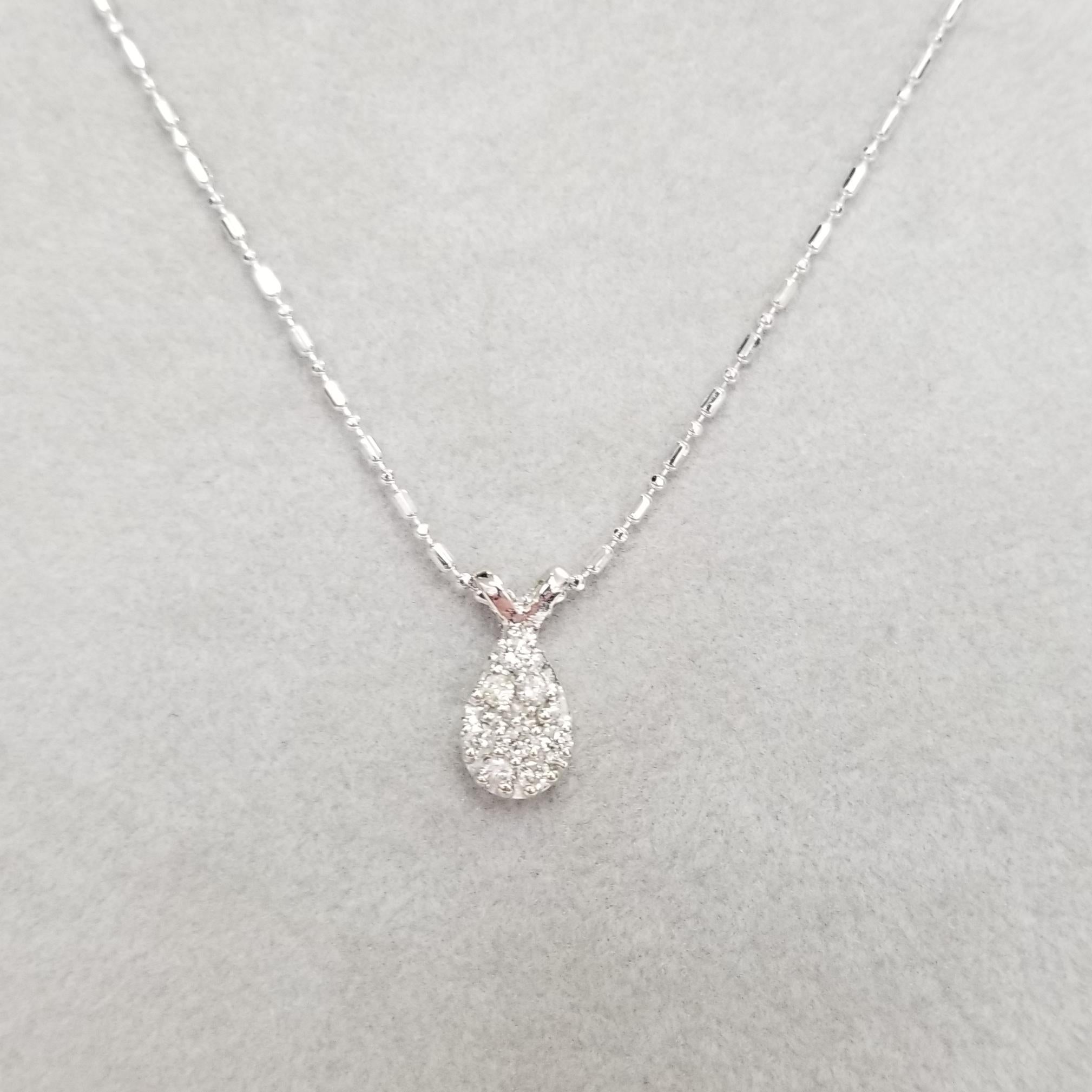 Specifications:
    main stone: ROUND CUT DIAMONDS
    DIAMONDS: 8 PCS
    carat total weight: APPROXIMATELY .20 CTW
    color: G
    clarity: VS
    metal: 14K WHITE GOLD
    type:  PENDANT
    LENGTH: 16INCHES
