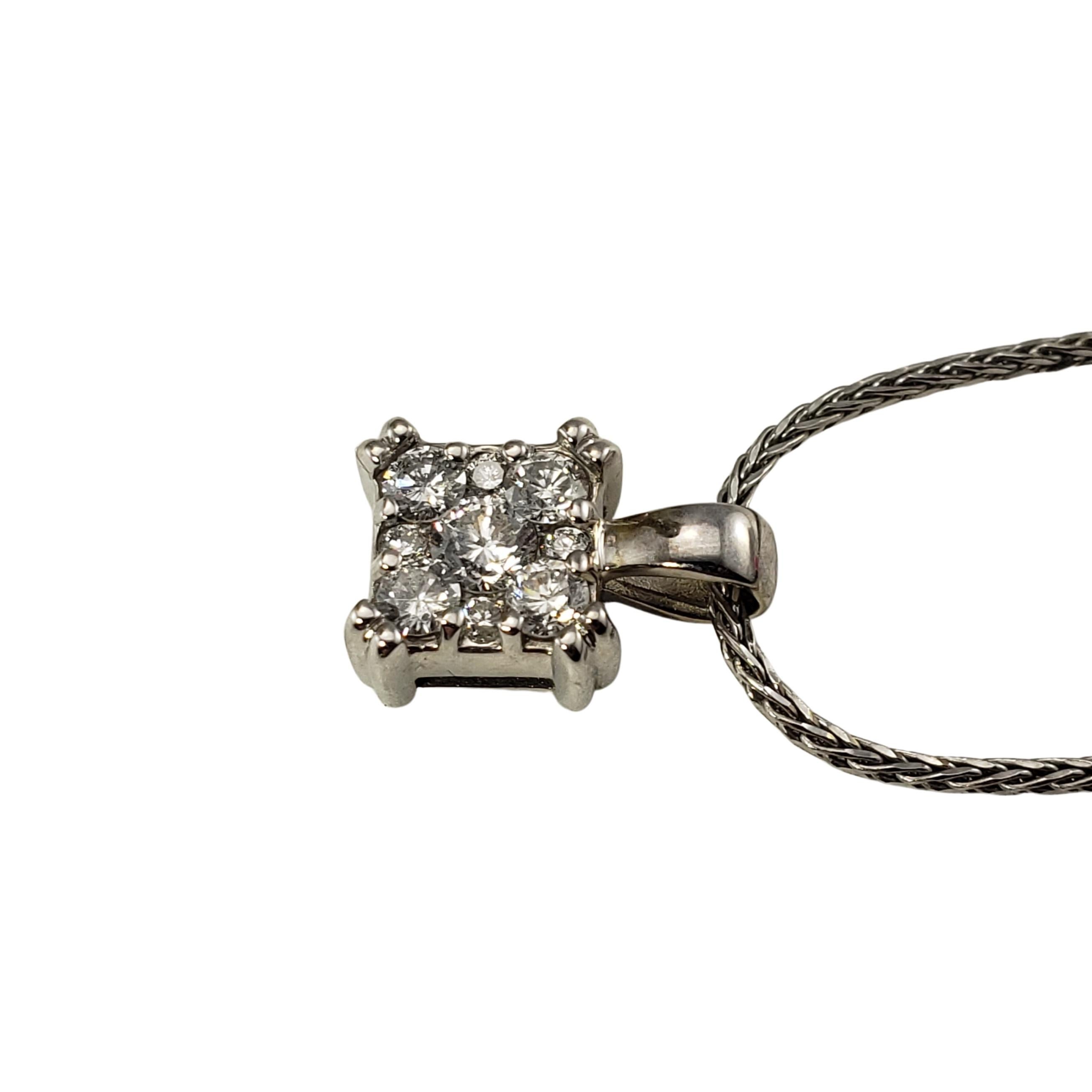 14 Karat White Gold Diamond Pendant Necklace-

This sparkling pendant necklace features nine round brilliant cut diamonds set in classic 14K white gold.

Approximate total diamond weight:  .38 ct.

Diamond color: H-K

Diamond clarity: SI2

Size: 16