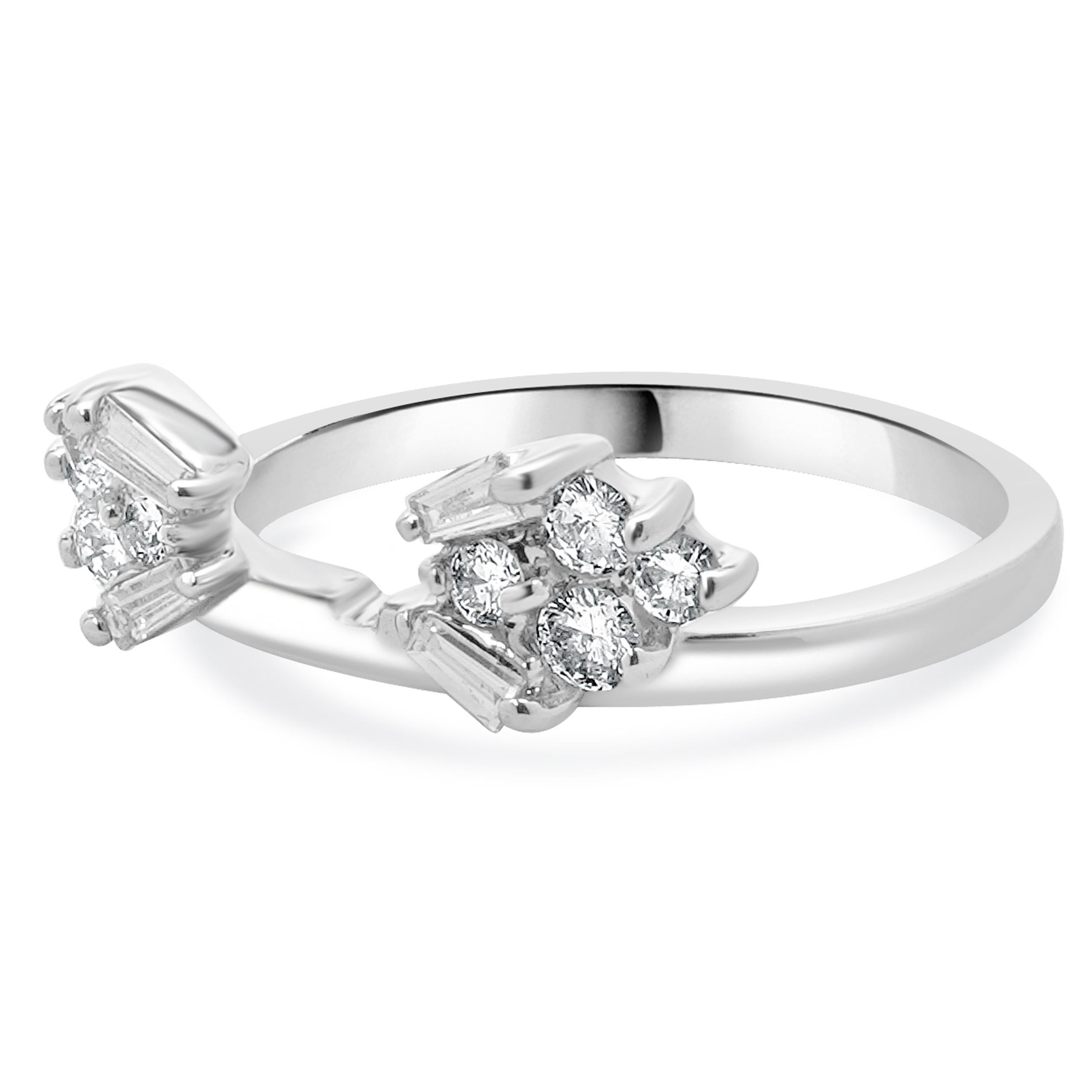 Designer: custom
Material: 14K white gold
Diamond: 12 round brilliant & baguette cut = 0.50cttw
Color: G / H
Clarity: SI2
Ring size: 7.5 (please allow two additional shipping days for sizing requests)
Weight: 3.29 grams
