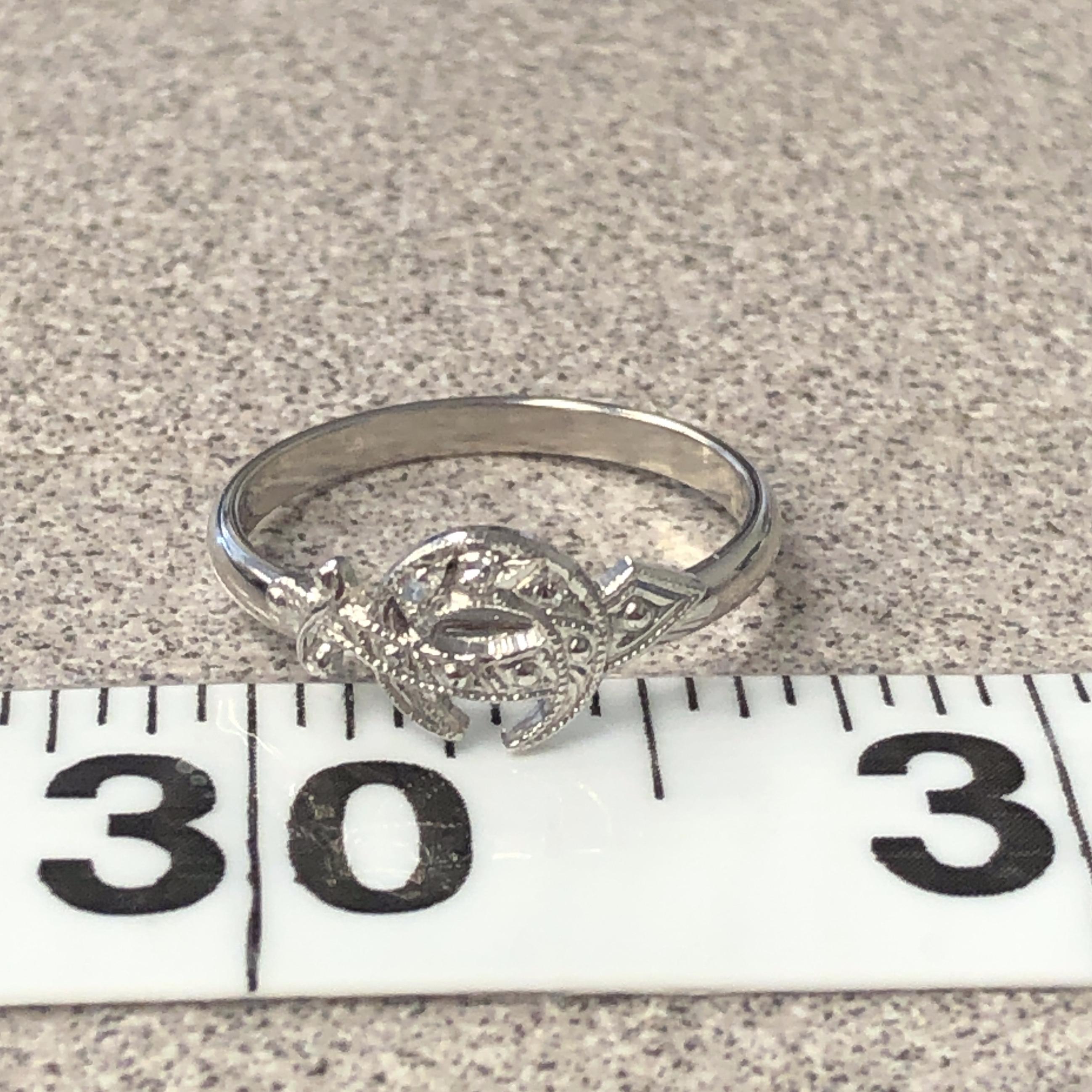 14 Karat White Gold Diamond Scimitar Ring For Sale 1