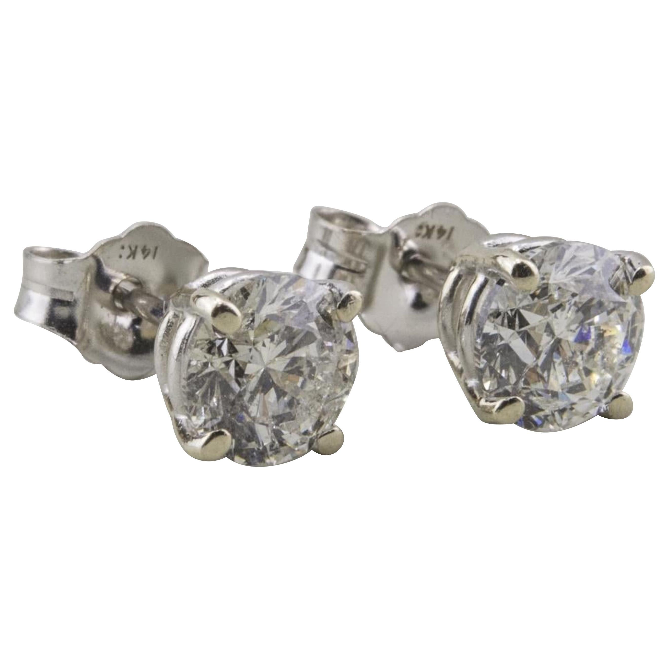 14 Karat White Gold Diamond Solitaire Earrings For Sale