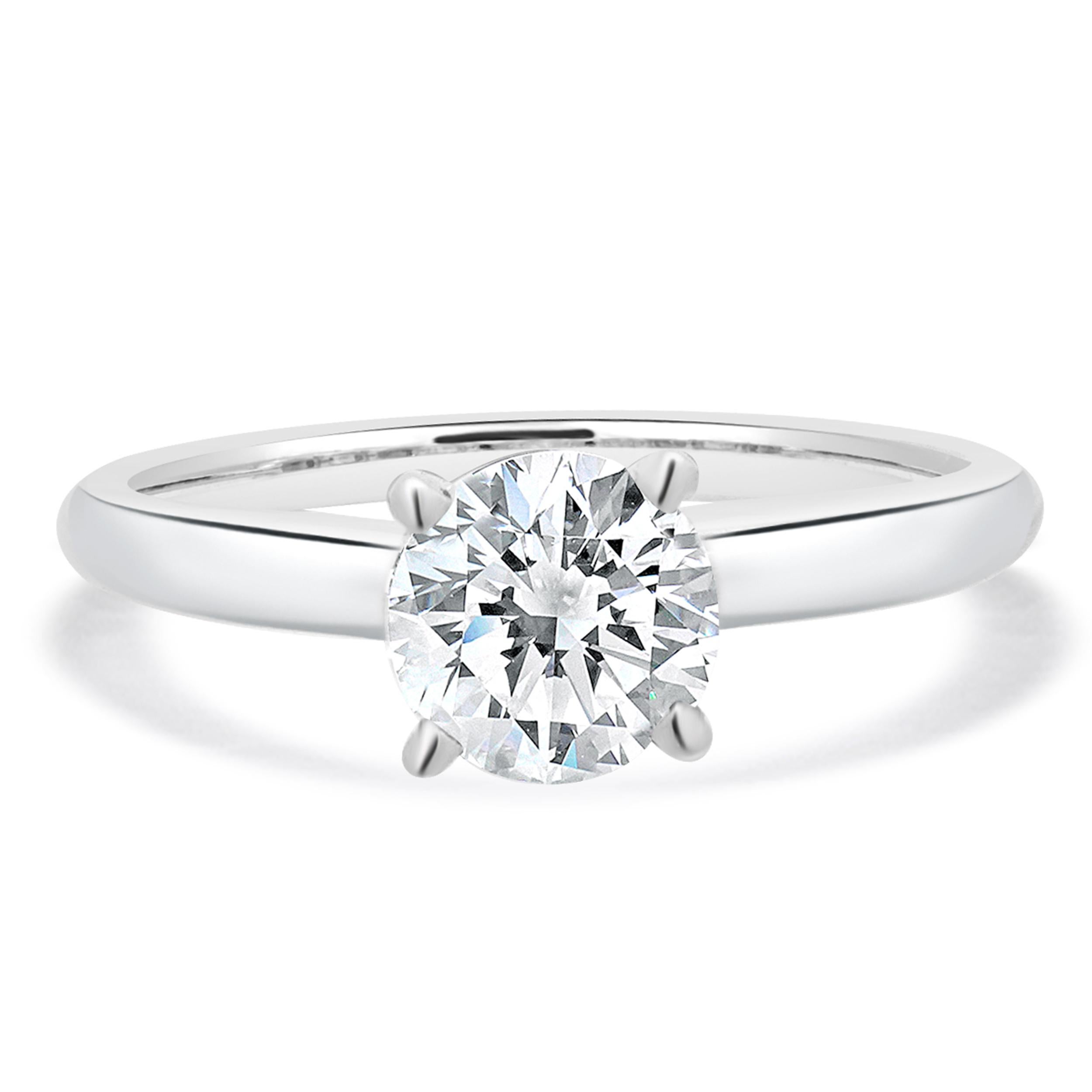 Bague de fiançailles solitaire en or blanc 14 carats avec diamant en vente