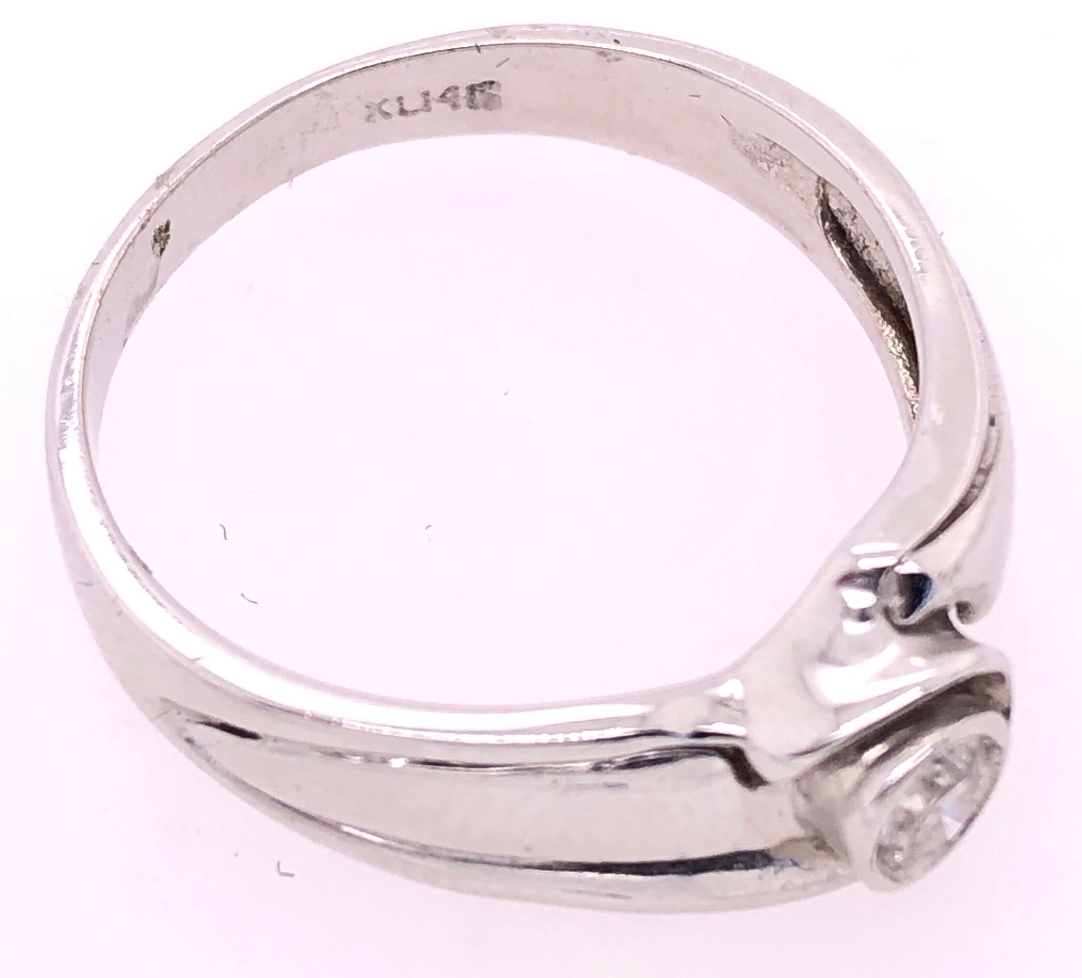 Modern 14 Karat White Gold Diamond Solitaire Engagement Ring For Sale