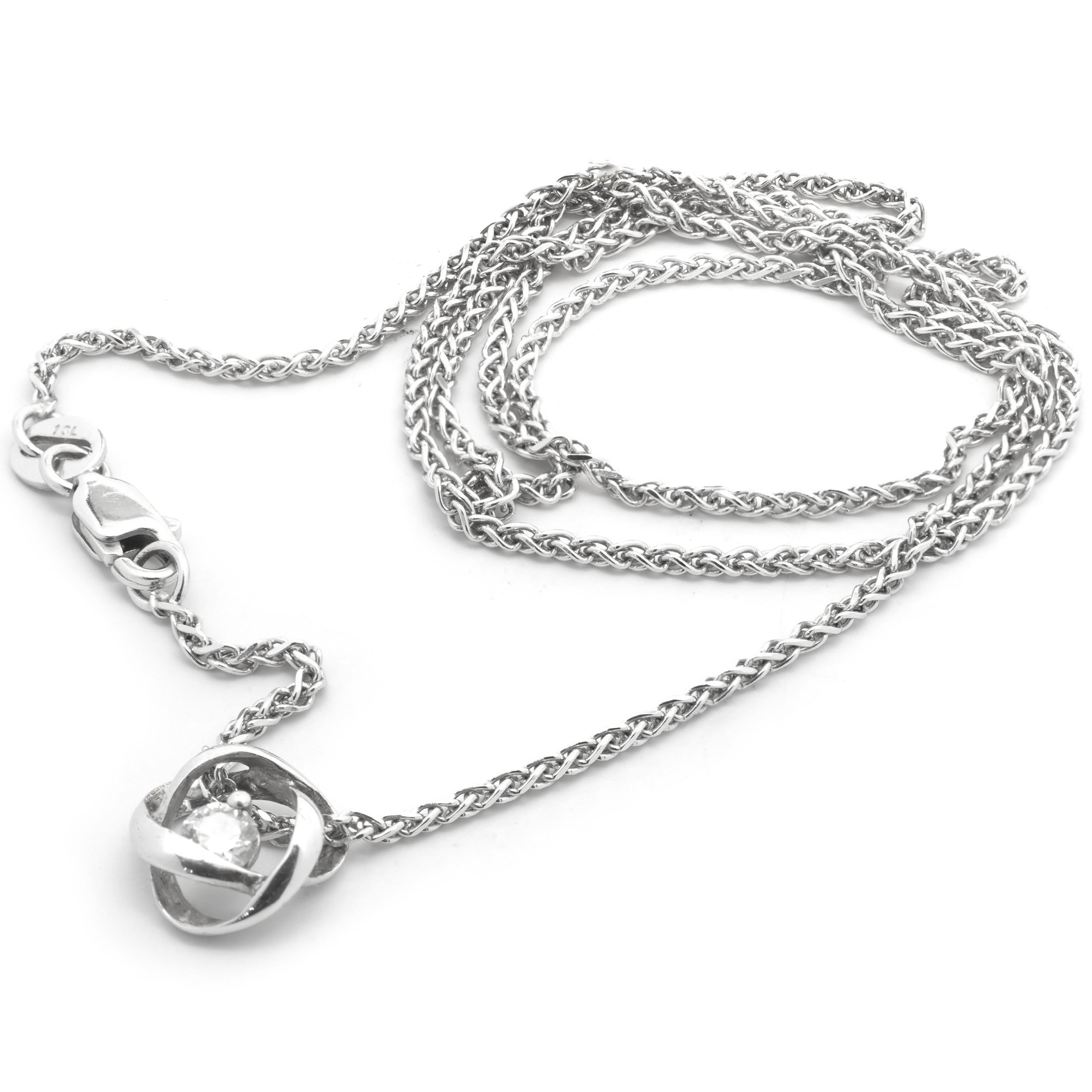 Designer: custom design
Material: 14K white gold
Diamonds: 1 round brilliant cut = .15cttw
Color: I
Clarity: SI1
Dimensions: necklace measures 18-inches in length 
Weight: 4.26 grams
