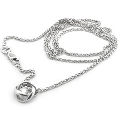 14 Karat White Gold Diamond Solitaire Swirl Necklace