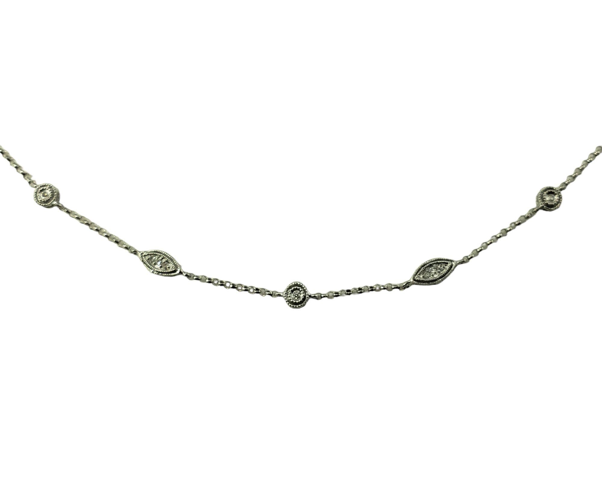 Vintage 14 Karat White Gold Diamond Station Necklace-

This lovely station necklace features 62 round single cut diamonds set in beautifully detailed 14K white gold.

Approximate total diamond weight: .50 ct.

Diamond clarity: SI2-I

Diamond color: