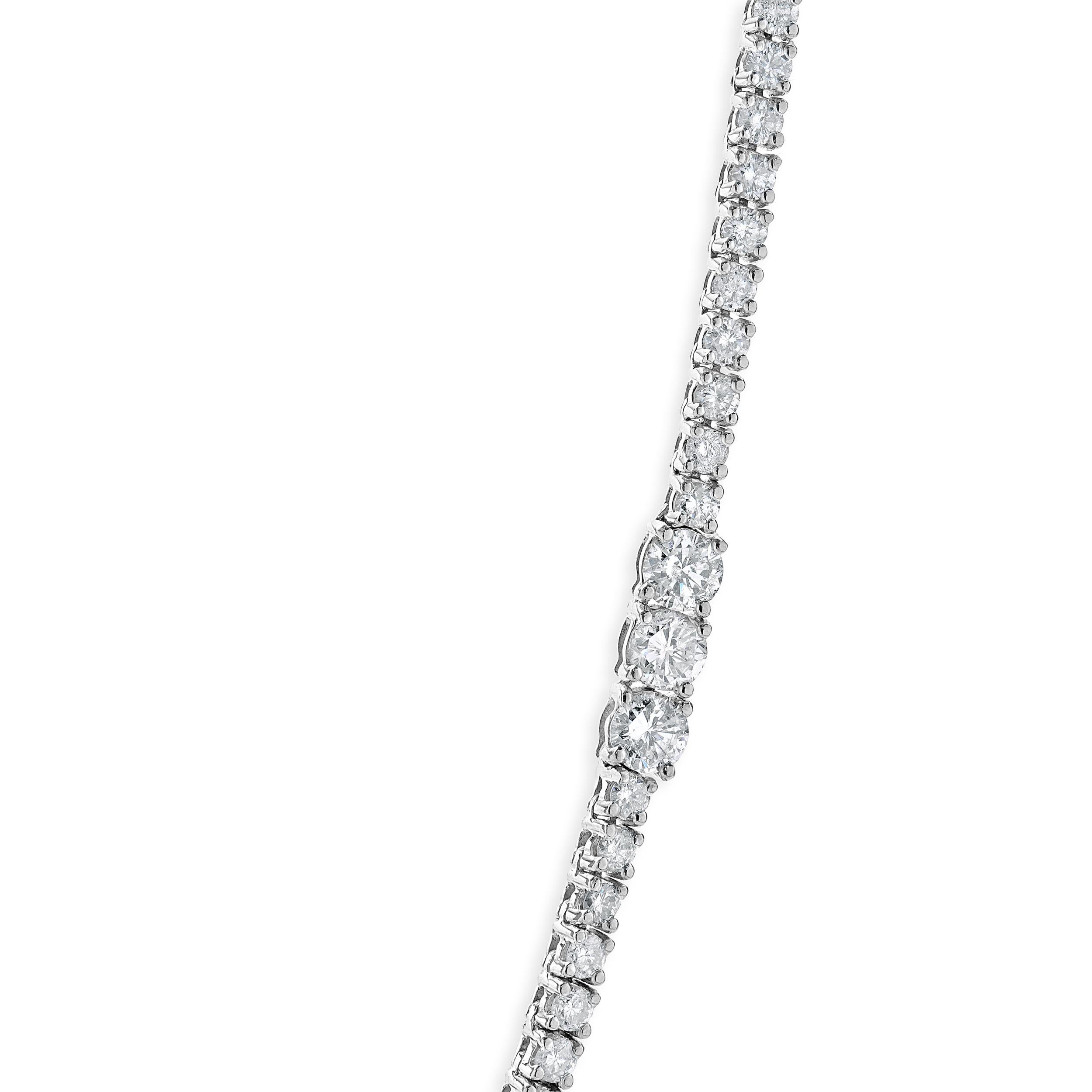 Designer: personalizzato
Materiale: oro bianco 14 carati
Diamanti: taglio brillante rotondo = 8,19cttw
Colore: G / H.
Chiarezza: SI1
Dimensioni: la collana misura 18 pollici di lunghezza
Peso: 19,80 grammi