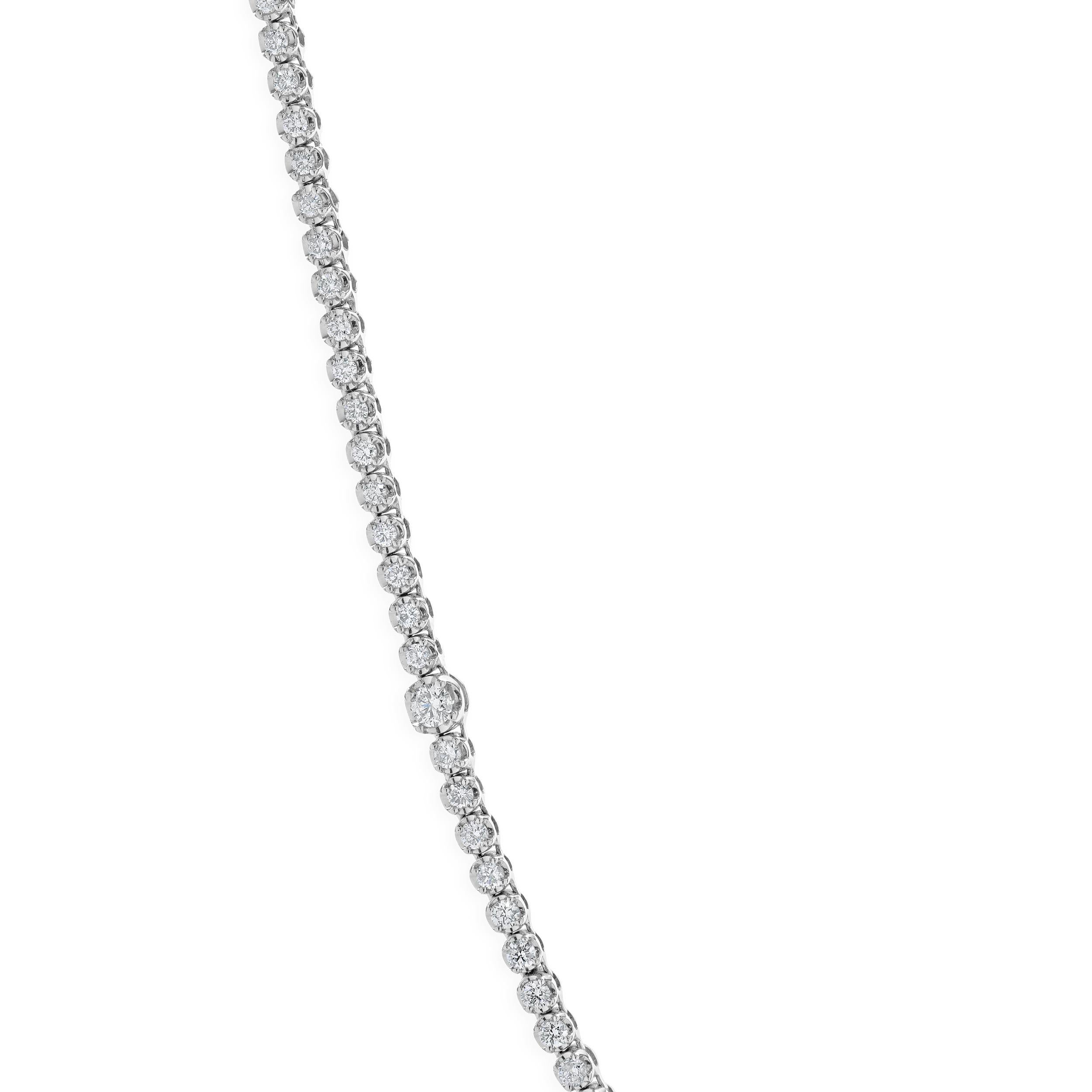 Designer: custom
Material: 14K white gold
Diamonds: round brilliant cut = 3.61cttw
Color: G / H
Clarity: SI1
Dimensions: necklace measures 18-inches in length
Weight: 18.14 grams