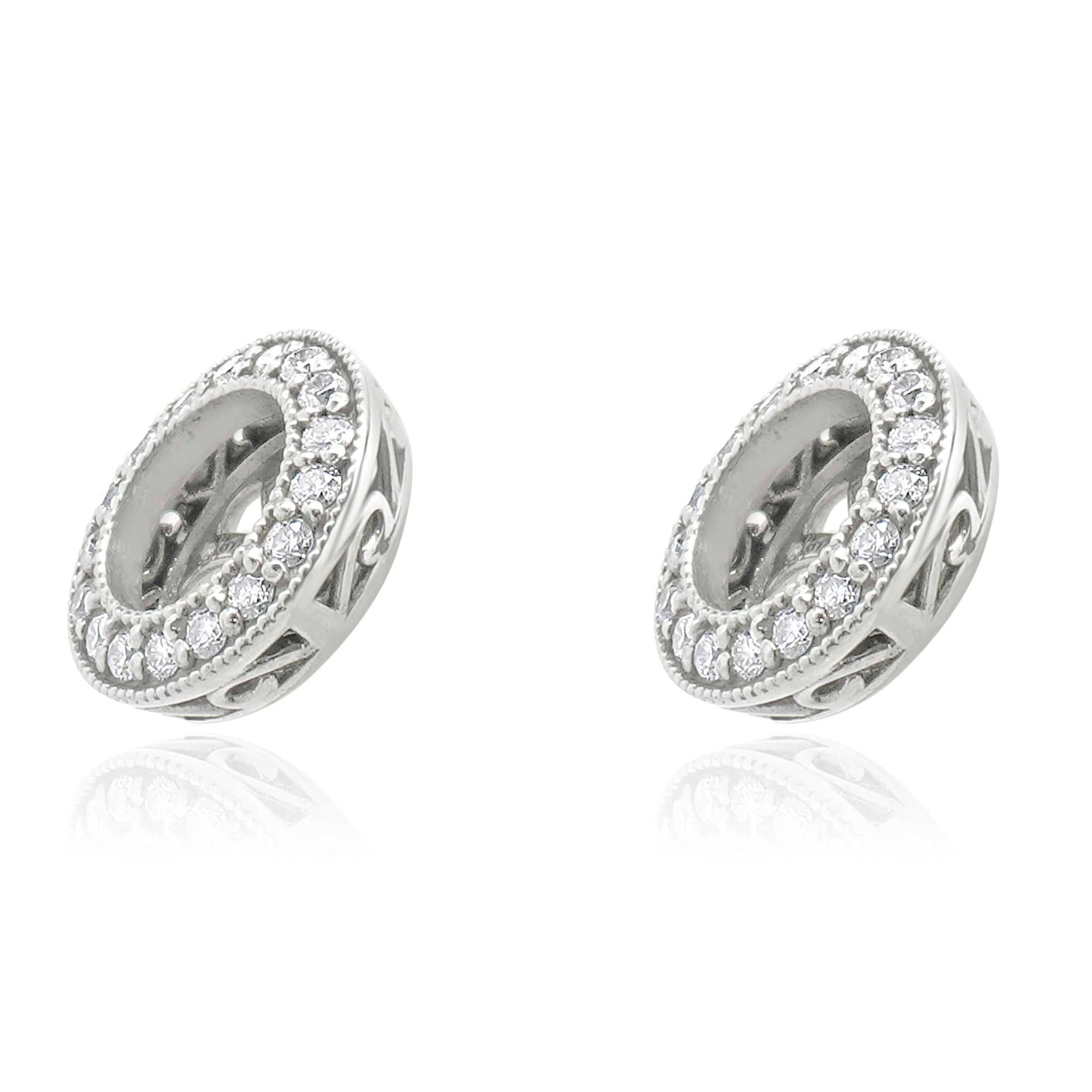 Material: 14K white gold
Diamonds: round brilliant cut = 0.32cttw
Color: H
Clarity: SI1
Dimensions: earrings measure approximately 7mm wide
Weight: 2.33 grams