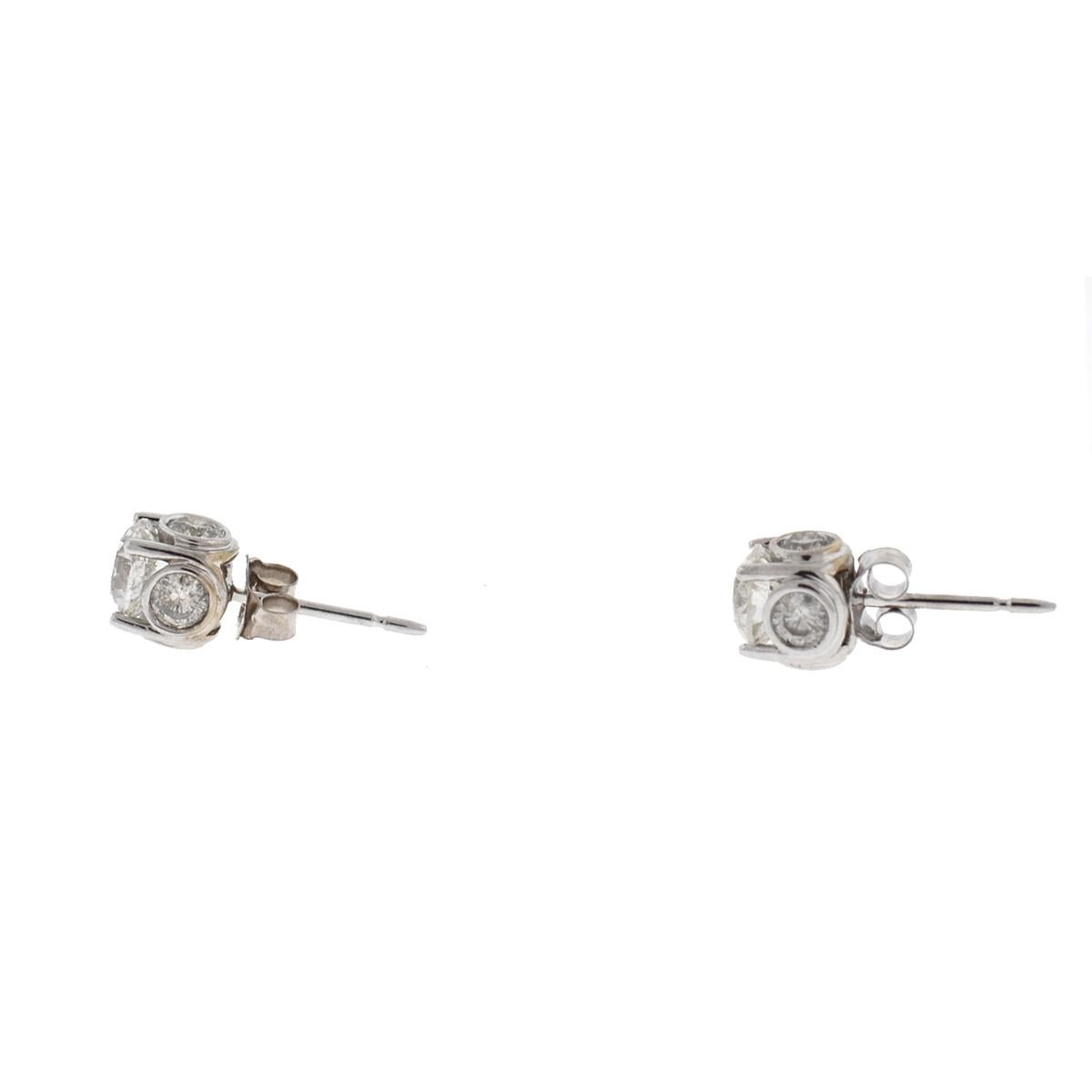 Company-N/A
Style-Diamond Stud Earrings
Metal-14k White Gold 
StonesCenter Diamond Approx. 1.75 Cts TW i-j i1
Side Stones Approx .10 Cts each
Weight-2.02 G
Includes-Earrings Only
SKU-8783-2MEE