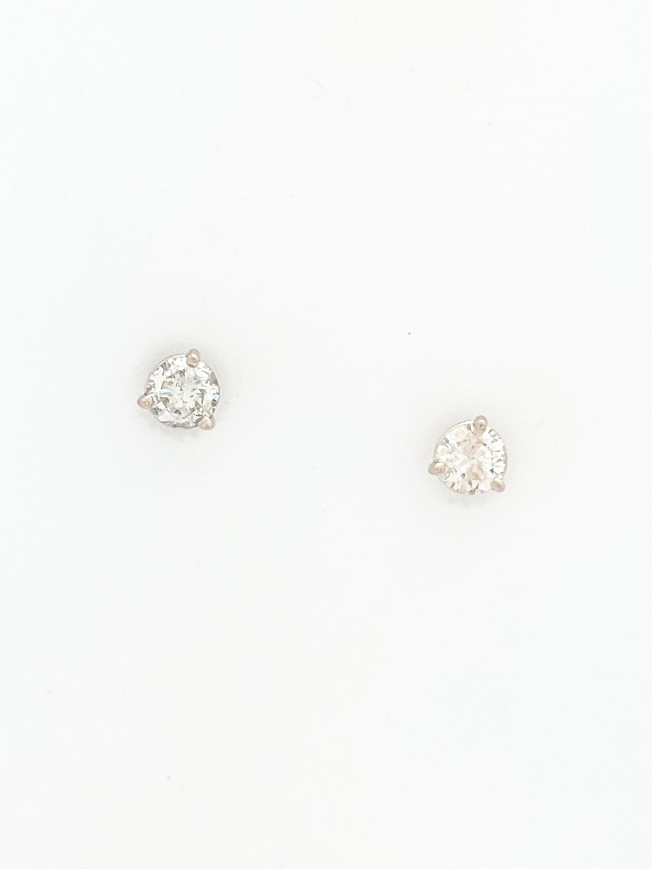 14K White Gold Diamond Stud Earrings .50tcw I1/I 

You are viewing a Beautiful Pair of Diamond Stud Earrings.

These earrings are crafted from 14k white gold and weighs .9 grams. Each earring features (1) .25ct natural round diamond which measures