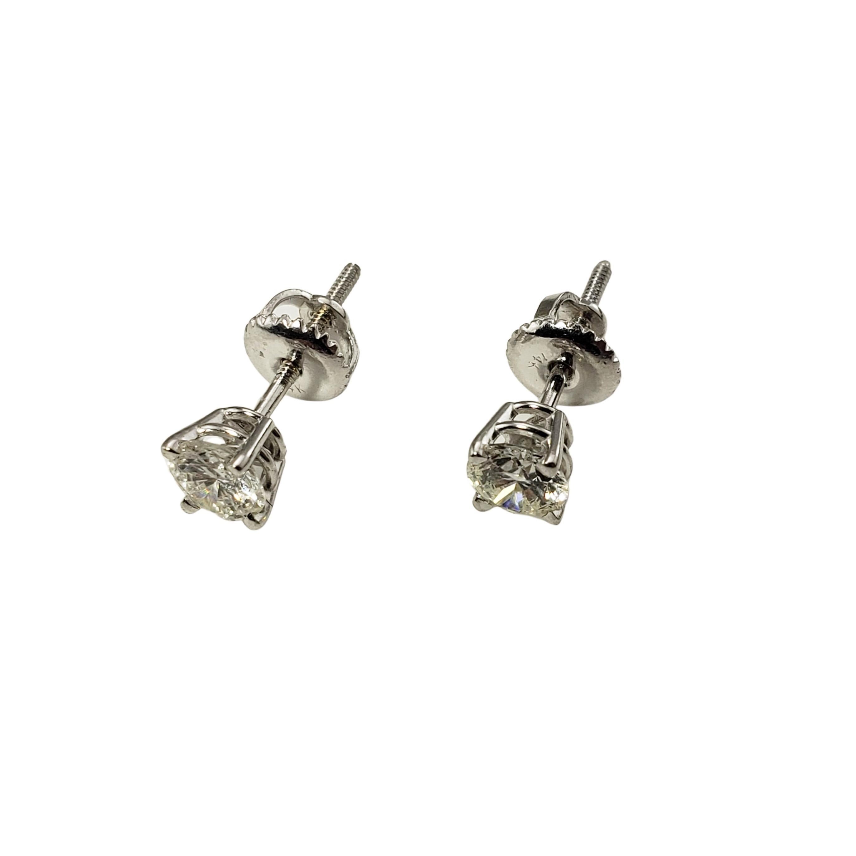 Brilliant Cut 14 Karat White Gold Diamond Stud Earrings .74 TCW
