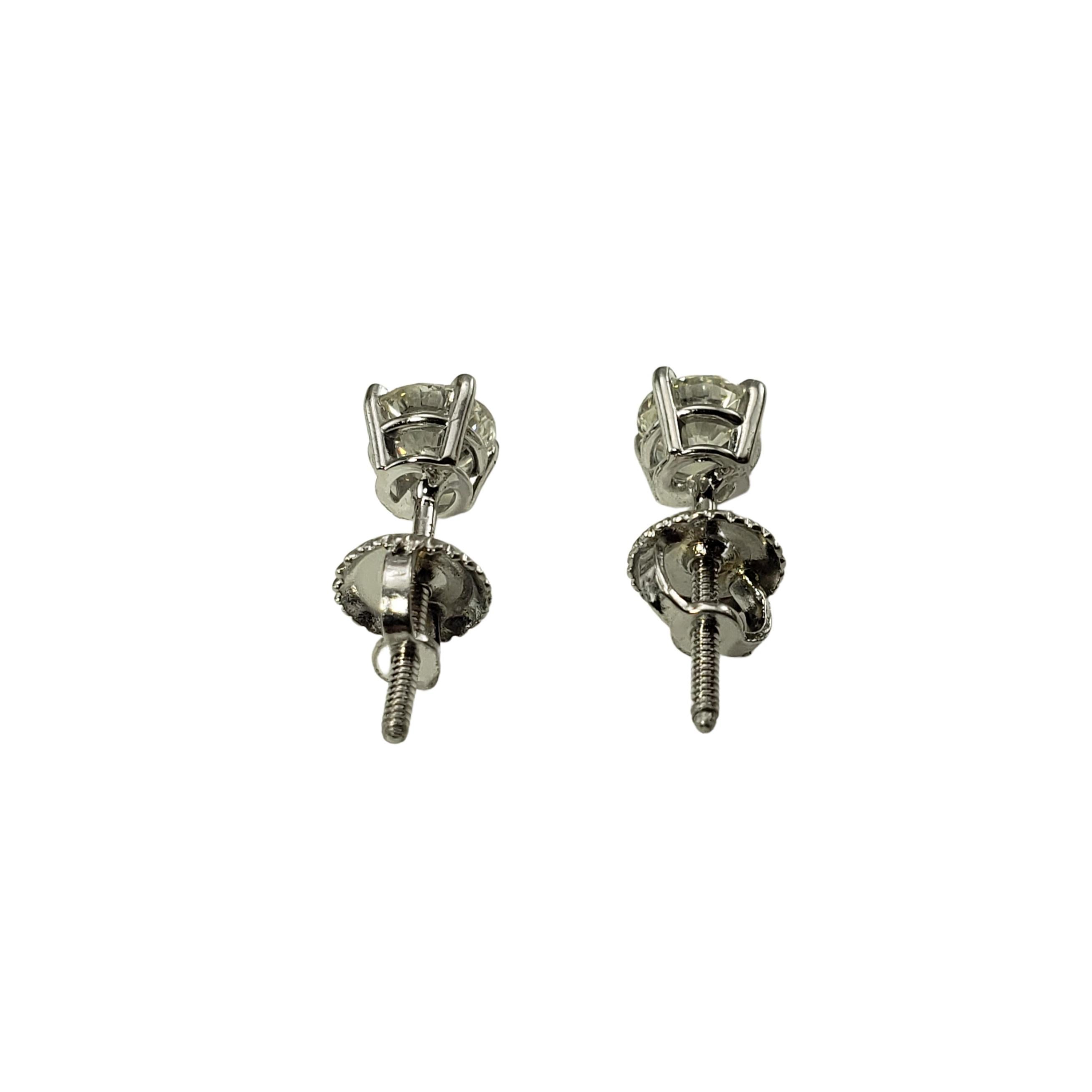 Women's 14 Karat White Gold Diamond Stud Earrings .74 TCW