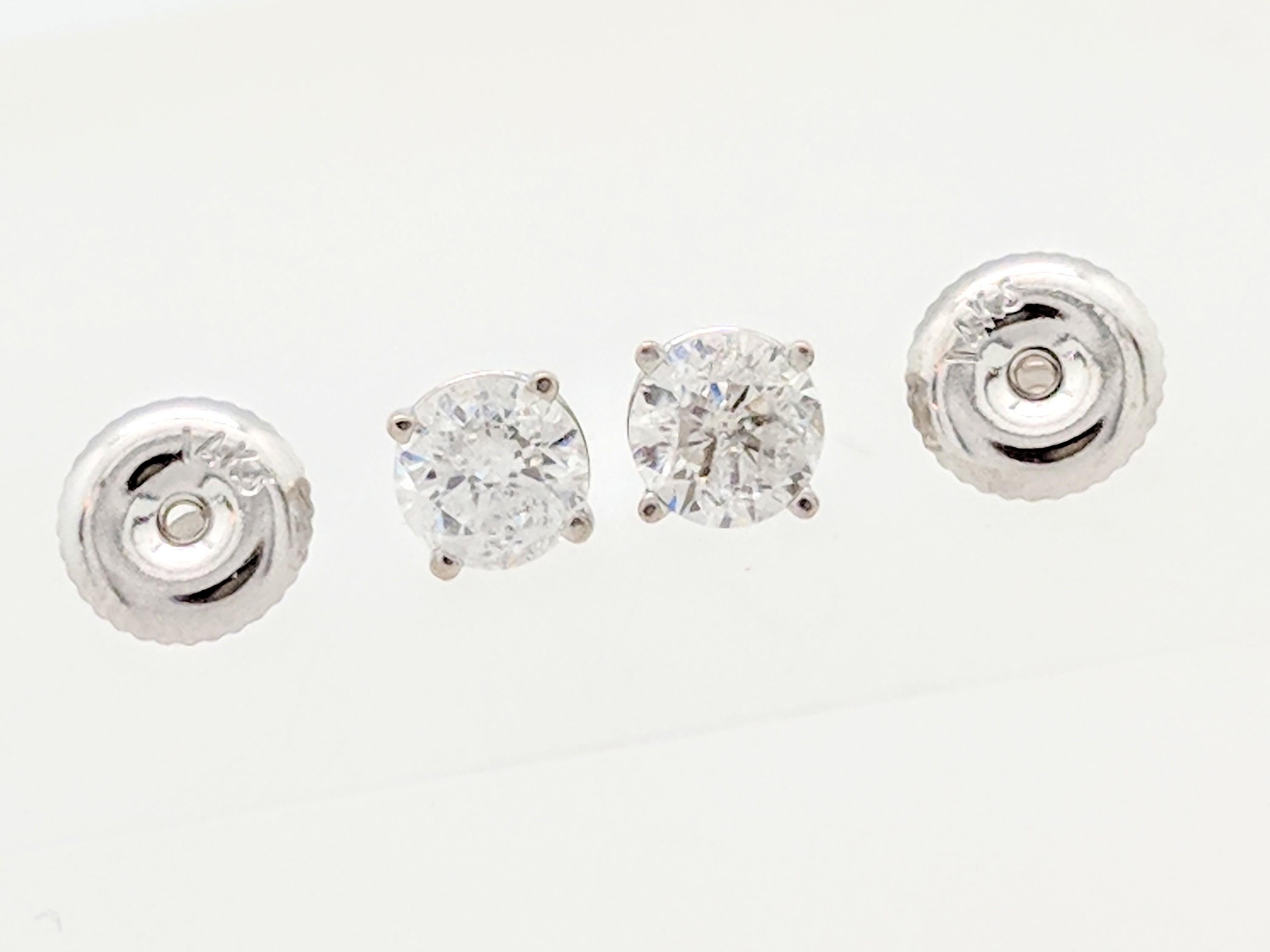 Contemporary 14 Karat White Gold Diamond Stud Earrings .75 Carat I1/I