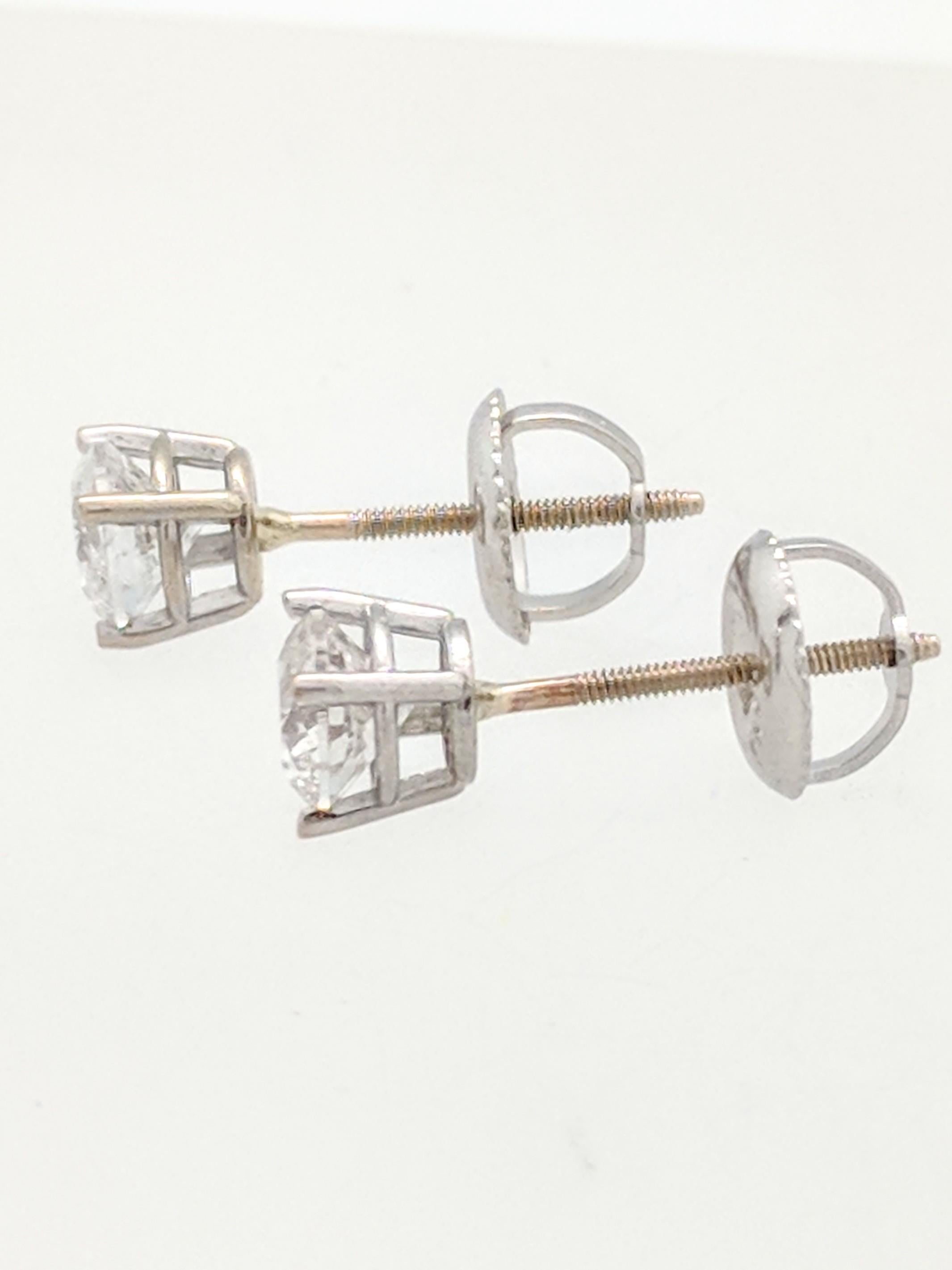 Round Cut 14 Karat White Gold Diamond Stud Earrings .75 Carat I1/I