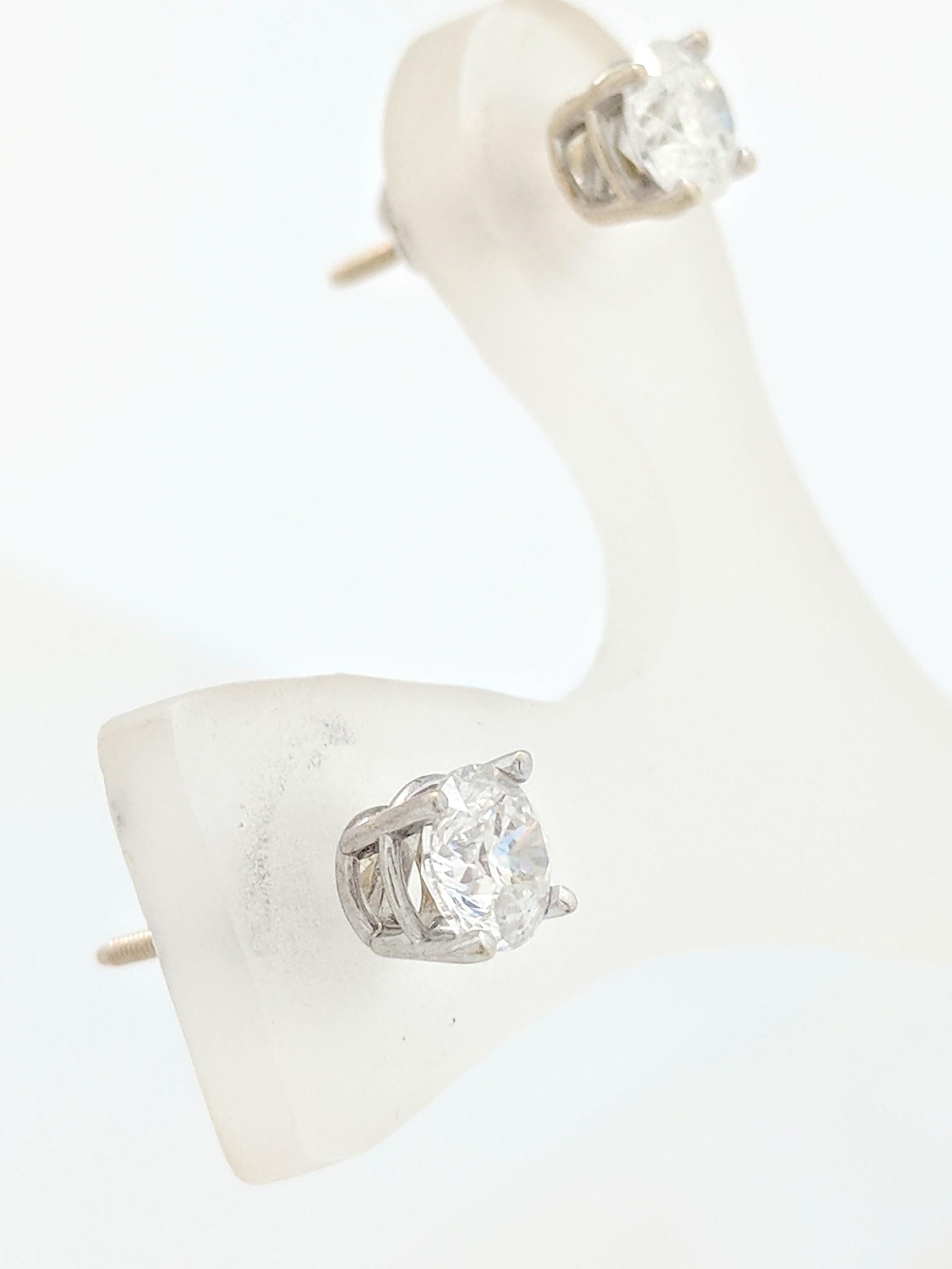 Women's 14 Karat White Gold Diamond Stud Earrings .75 Carat I1/I