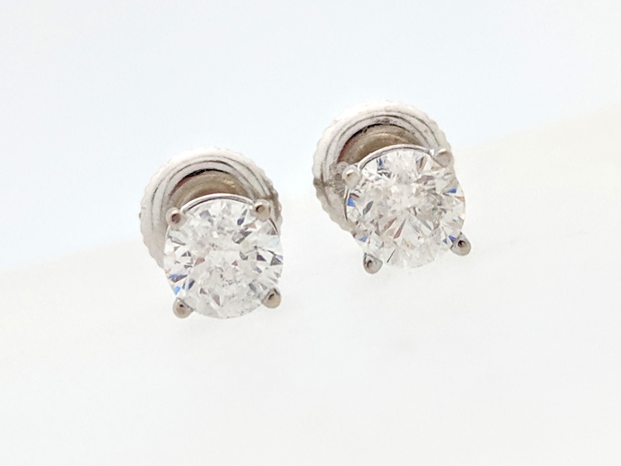 14 Karat White Gold Diamond Stud Earrings .75 Carat I1/I 1