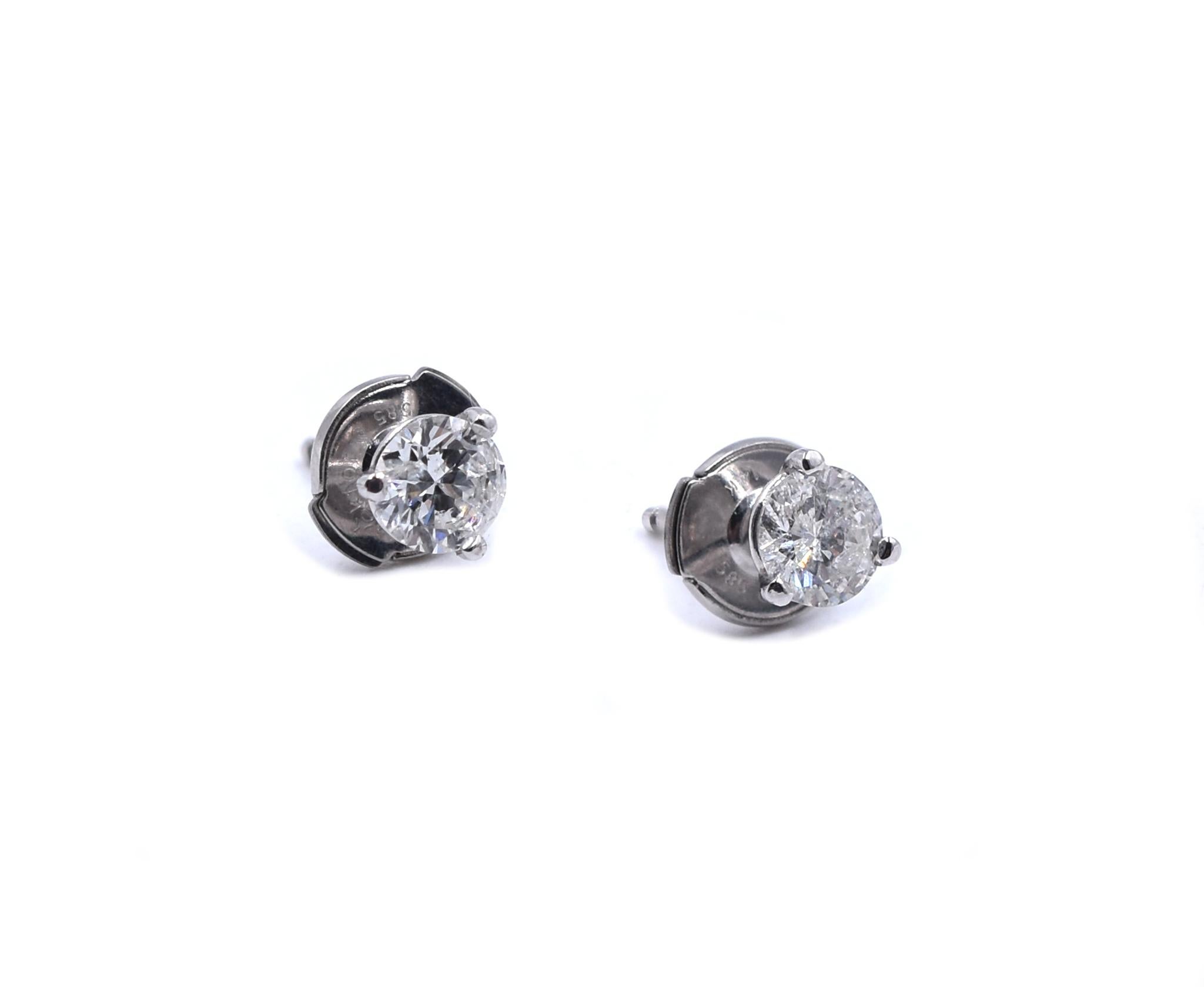 Material: 14k white gold
Diamond: 2 round brilliant cut = .65cttw
Color: I
Clarity: I1
Dimensions: earrings measure approximately 4.8mm in diameter
Fastenings: post with la pousette backs
Weight:  1.00 grams
