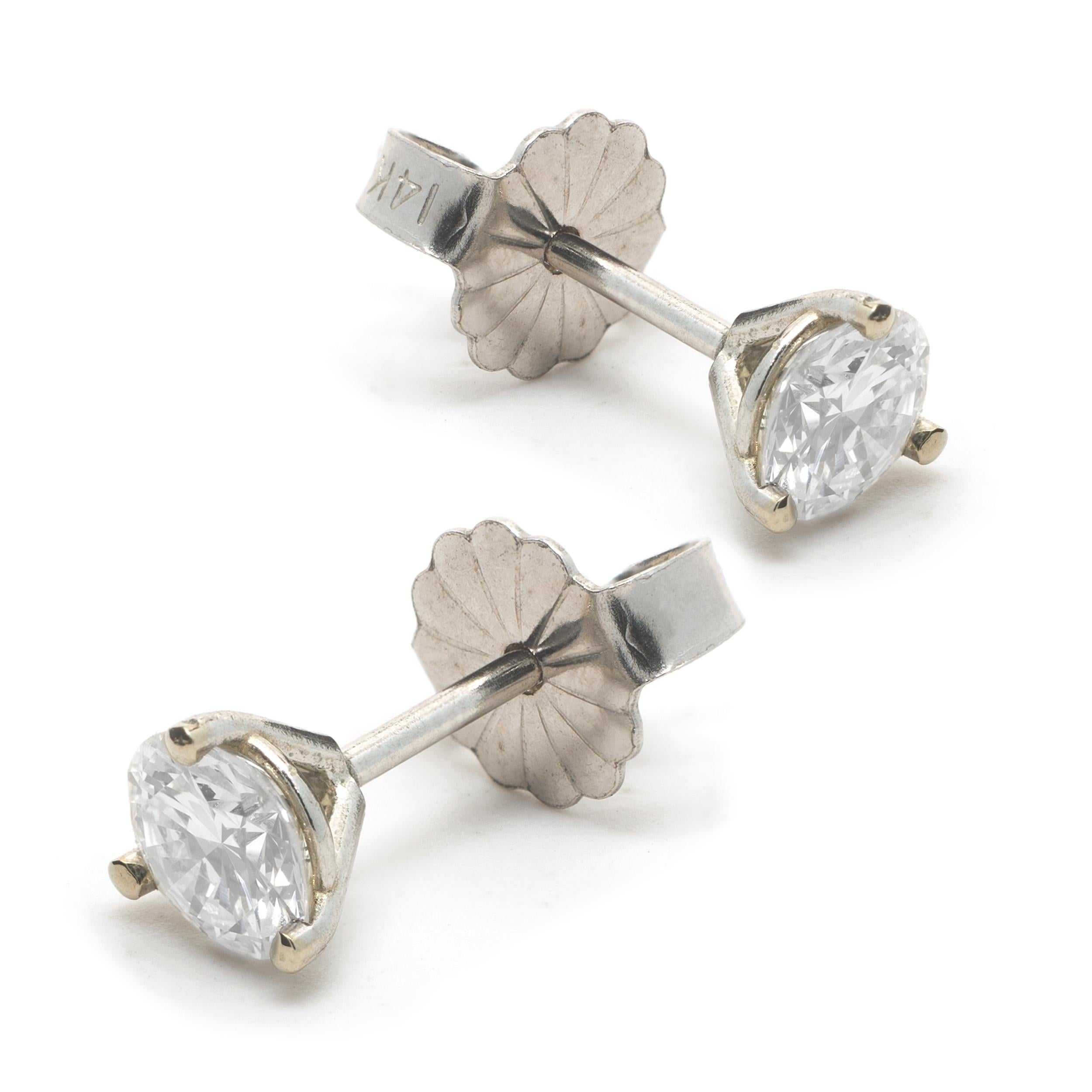 Material: 14k white gold
Diamond: 2 round brilliant cut = .60cttw
Color: G
Clarity: SI2
Dimensions: earrings measure approximately 4.87mm in diameter
Fastenings: post with friction backs
Weight:  1.06 grams

