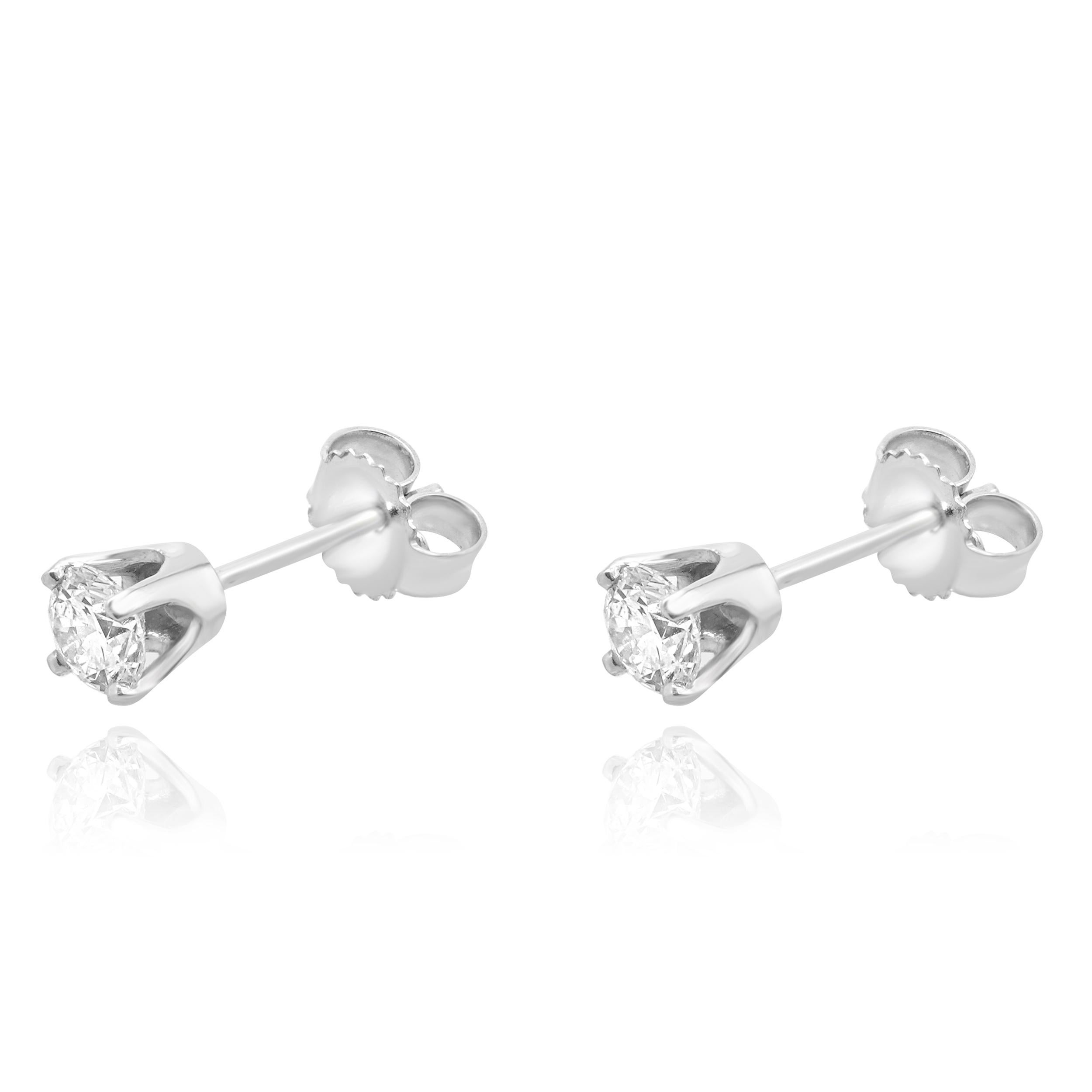 Matériau : Or blanc 14K
Diamants : 2 diamants ronds de taille brillant= 0.16cttw
Couleur : G
Clarté : SI1
Dimensions : les boucles d'oreilles mesurent environ 3 mm de diamètre.
Fermetures : friction
Poids : 0,41 grammes