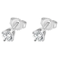 Boucles d'oreilles en or blanc 14 carats avec diamants