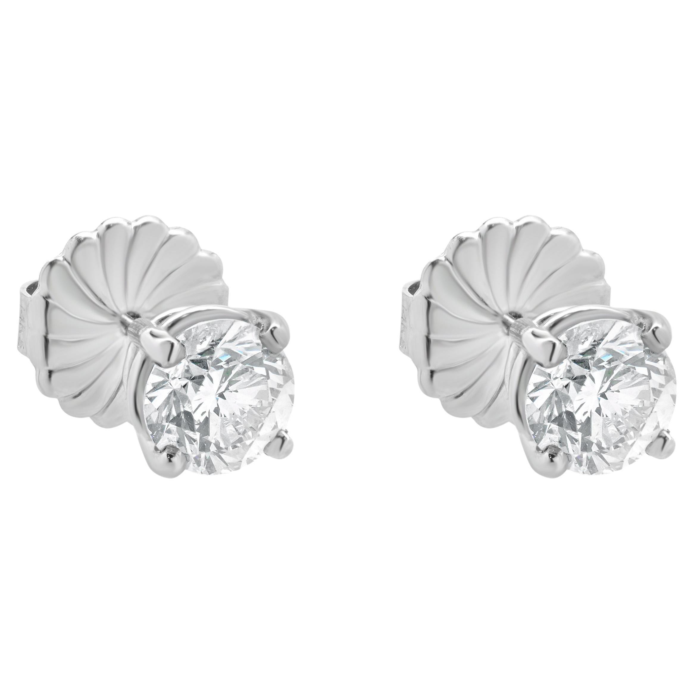 Orecchini con diamante in oro bianco 14 carati in vendita