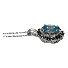 14 Karat White Gold Diamond, Swiss Blue Topaz and Sapphire Pendant 2CTW