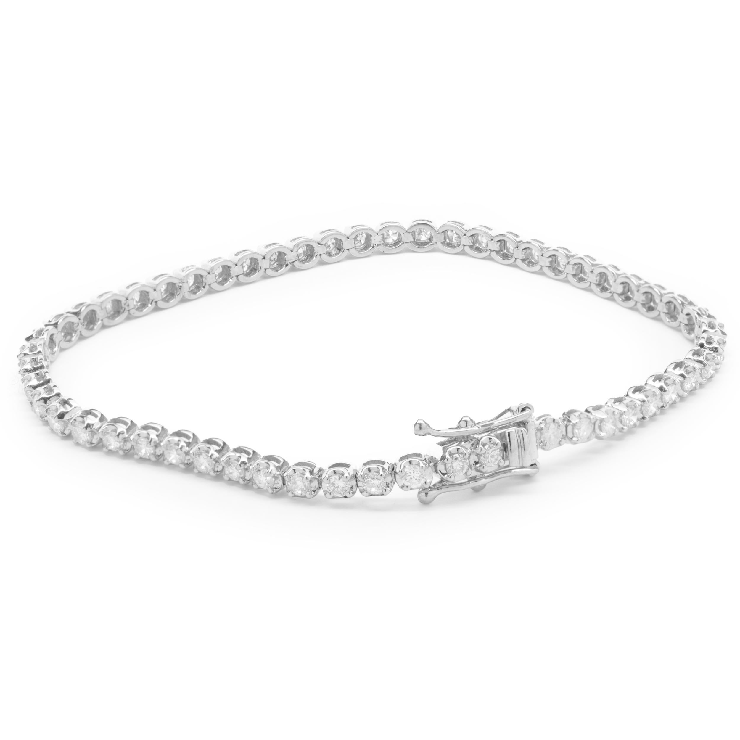 Designer: custom 
Material: 14K white gold
Diamond: 54 round brilliant cut = 1.50cttw
Color:  G
Clarity: SI1
Dimensions: bracelet will fit up to a 6.5-inch wrist
Weight: 6.50grams