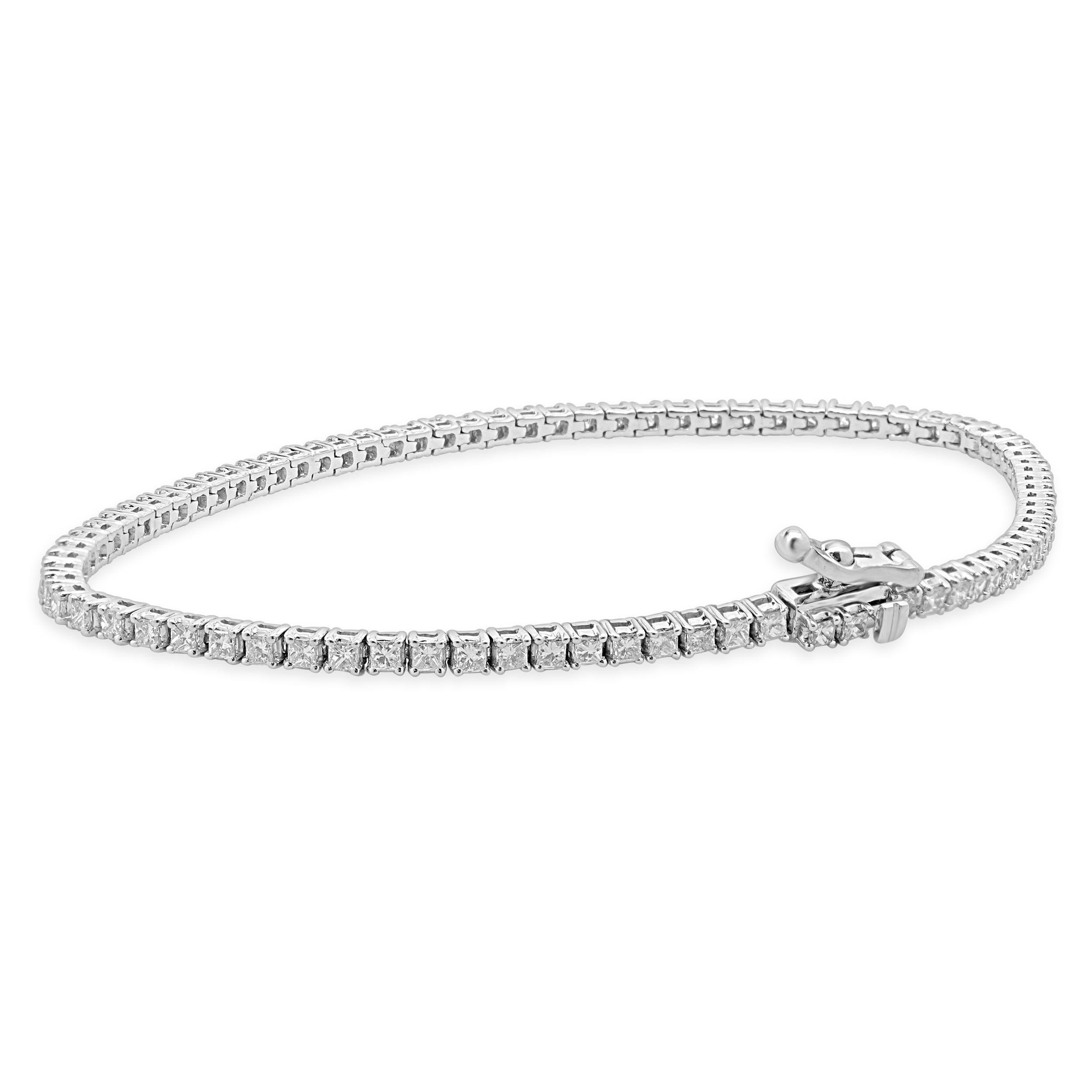 Material: 14K white gold
Diamonds: round brilliant cut = 1.82cttw
Color: H
Clarity: SI1
Dimensions: bracelet will fit up to a 7-inch wrist 
Weight: 6.26 grams