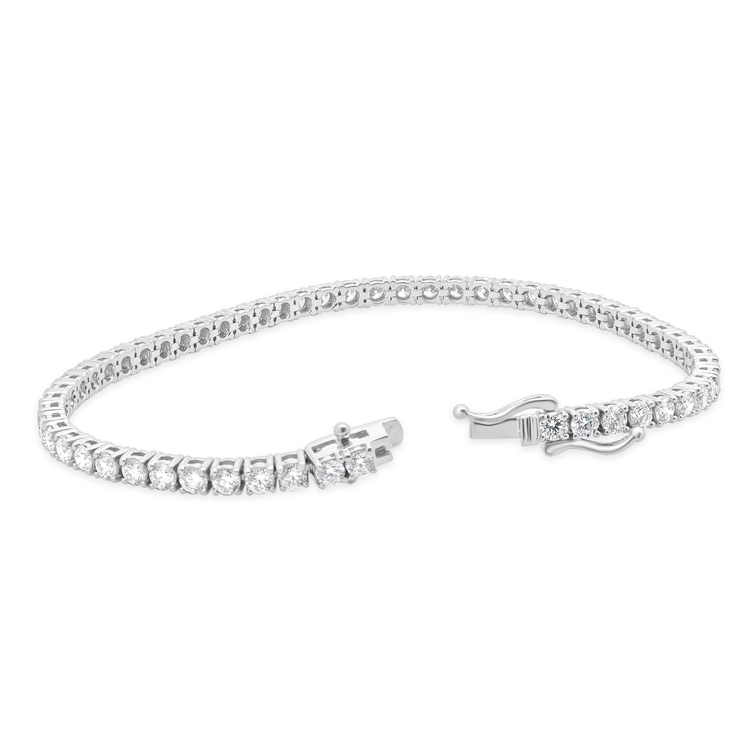 Designer: Sonderanfertigung
MATERIAL: 14K Weißgold
Diamant: 58 runder Brillantschliff = 5,00cttw
Farbe: G
Klarheit: VS
Abmessungen: Das Armband passt an ein Handgelenk von bis zu 7 Zoll
Gewicht: 9.19 Gramm
