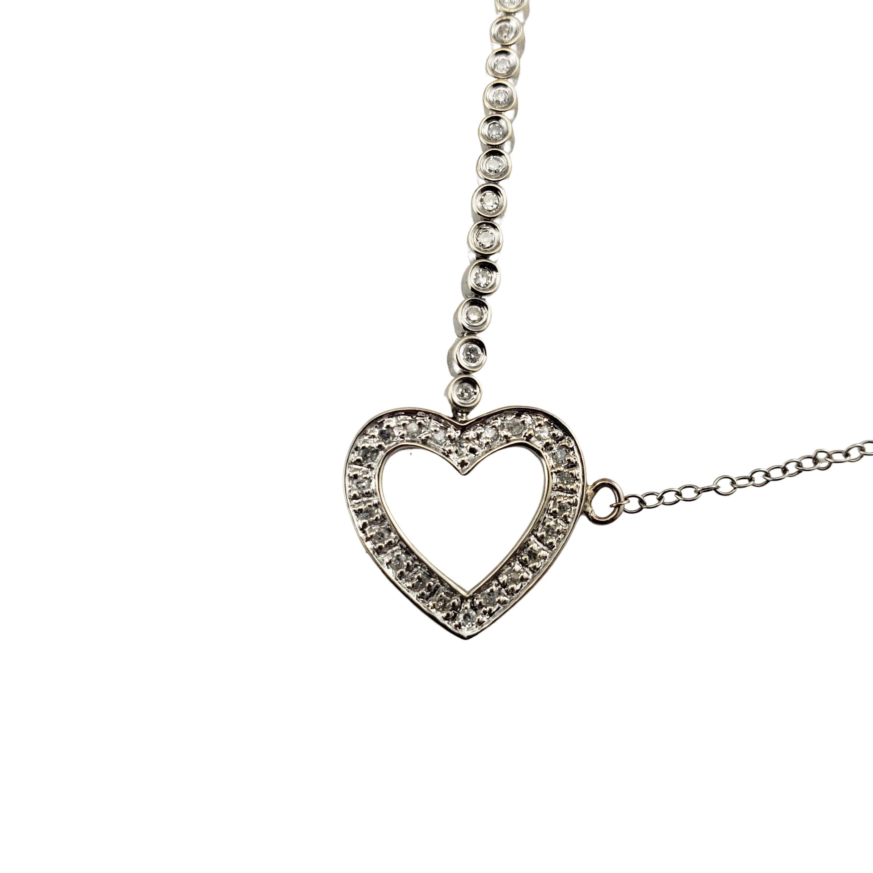 Women's 14 Karat White Gold Diamond Tennis Bracelet with Heart Clasp #16401 For Sale
