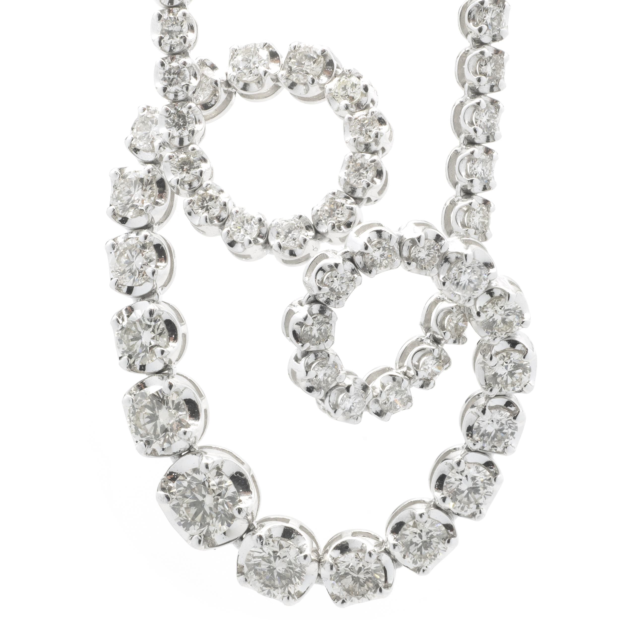 Designer: custom design
Material: 14K white gold 
Diamond: 126 round brilliant cut = 6.05cttw
Color: G / H
Clarity: SI1-2
Dimensions: necklace measures 16.5-inches in length
Weight: 14.71 grams
