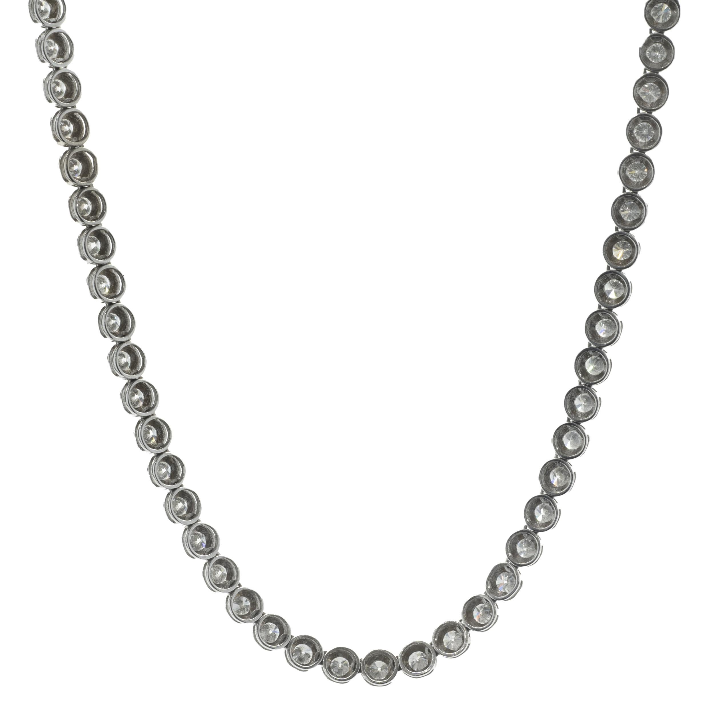 Designer: custom design
Material: 14K White Gold 
Diamond: 114 round brilliant cut = 12.51cttw
Color: G/H
Clarity: VS2-SI1
Dimensions: necklace measures 20-inches in length
Weight: 19.97 grams
