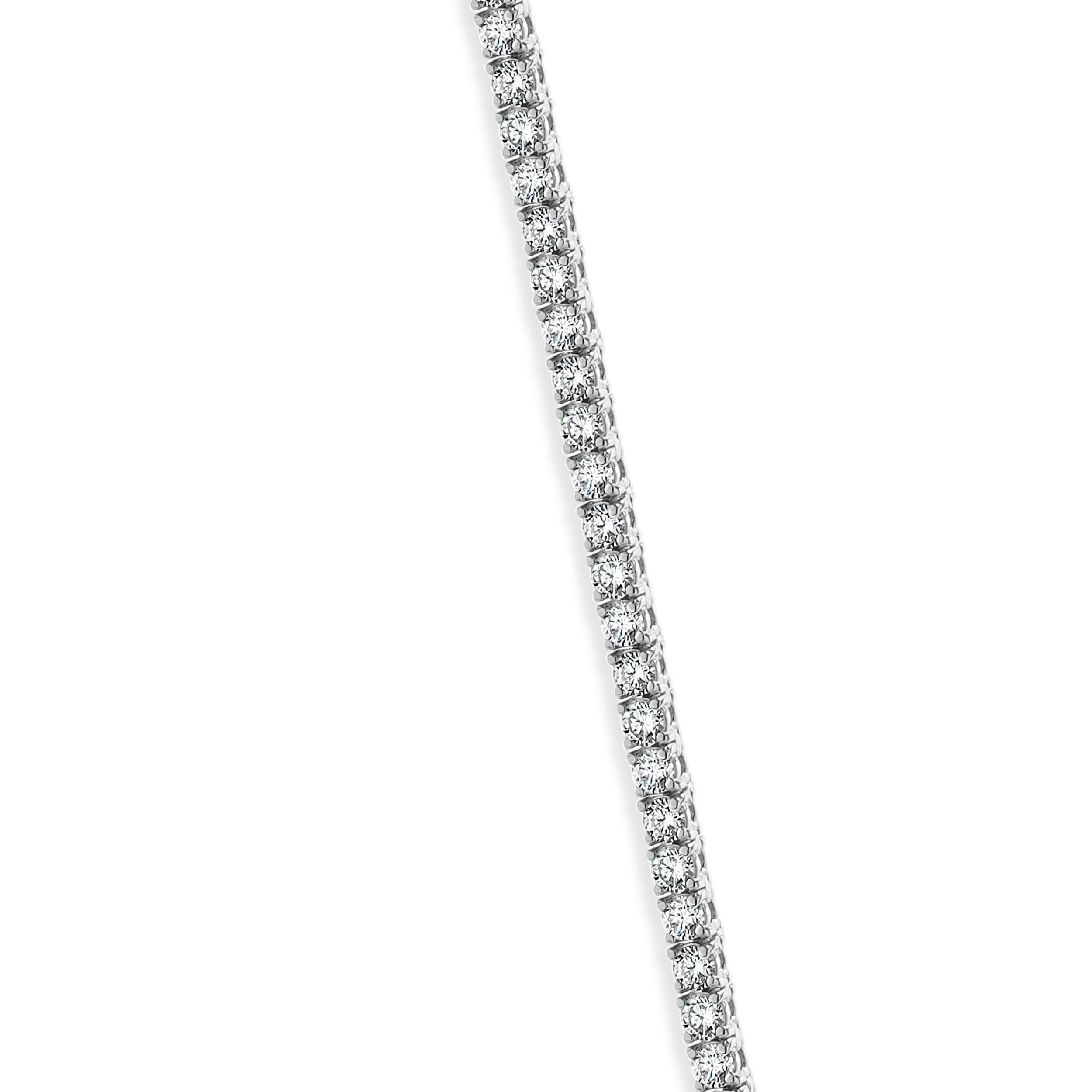 Designer: custom
Material: 14K white gold
Diamonds: 210 round brilliant cut = 12.61cttw
Color: H / I
Clarity: SI1-2
Dimensions: necklace measures 22-inches in length
Weight: 24.30 grams