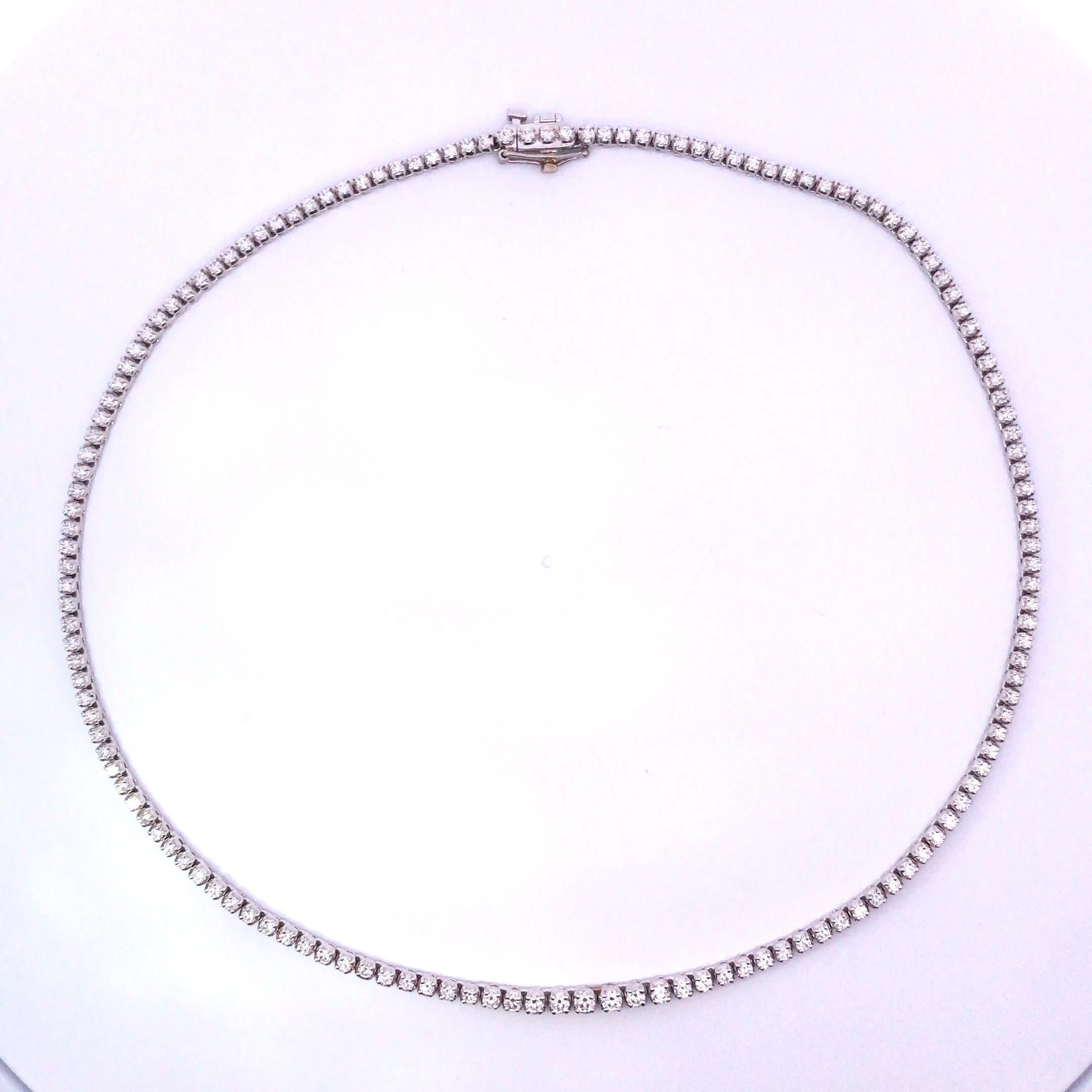 14 Karat White Gold Diamond Tennis Necklace

Incredible diamond necklace crafted in 14 Karat White Gold, showcasing 153 Round brilliant cut diamonds weighing approximately 4.75 total carat weight, diamonds range I color, VS clarity.