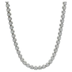 Collier de tennis en or blanc 14 carats et diamants