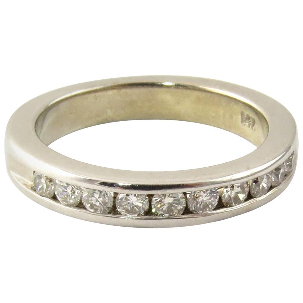 Alliance en or blanc 14 carats avec diamant
