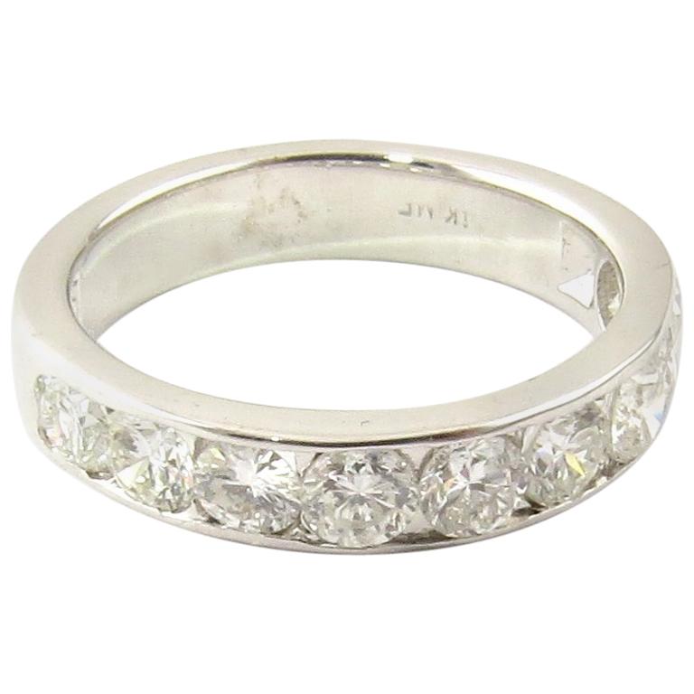 Alliance en or blanc 14 carats avec diamant