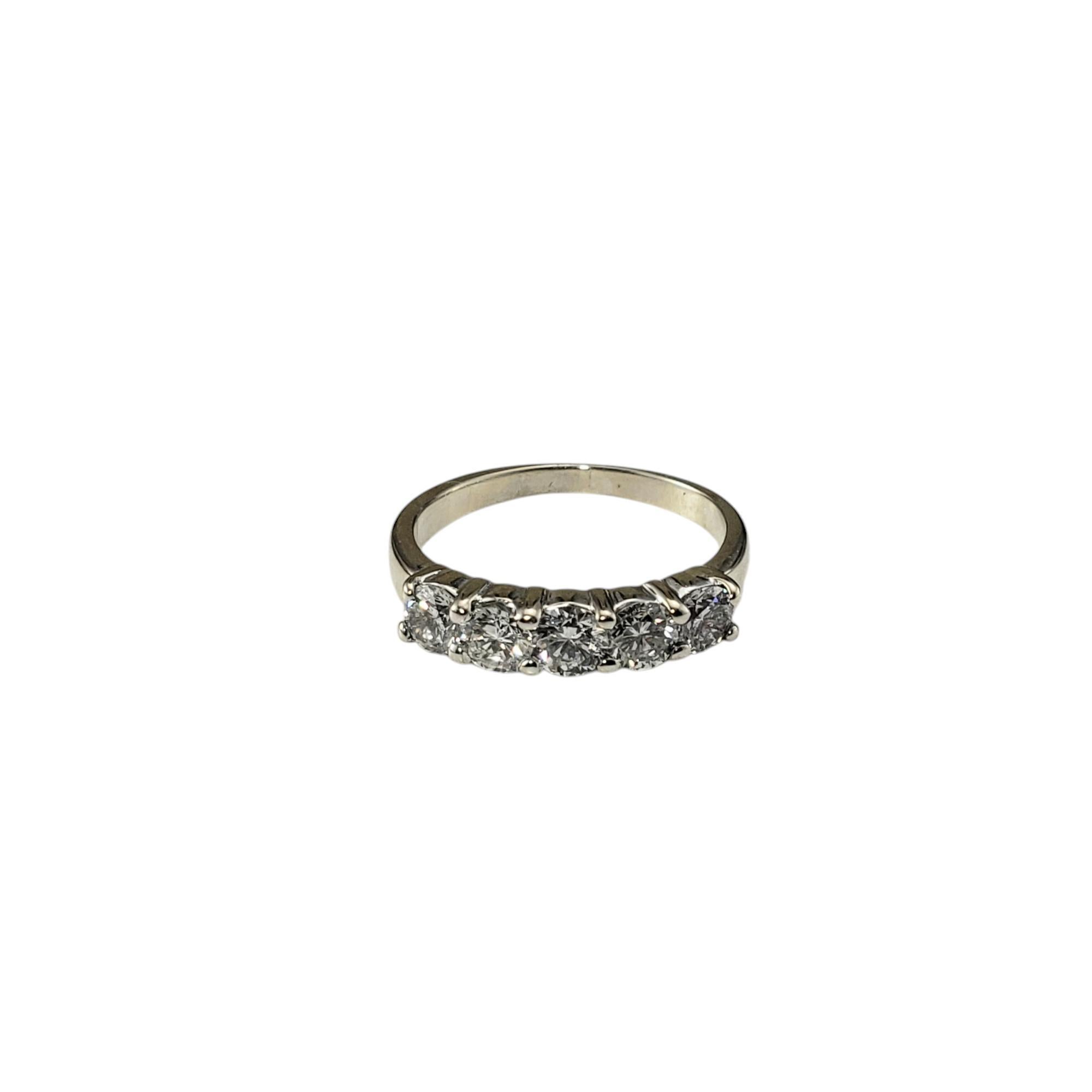 14 Karat White Gold Diamond Wedding Band Ring Size 5

This sparkling wedding band features five round brilliant cut diamonds set in classic 14K white gold.

Width: 3.5 mm. Shank: 2 mm.

Approximate total diamond weight: .85 ct.

Diamond color: