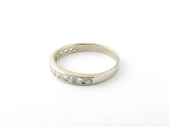 Alliance en or blanc 14 carats et diamants
